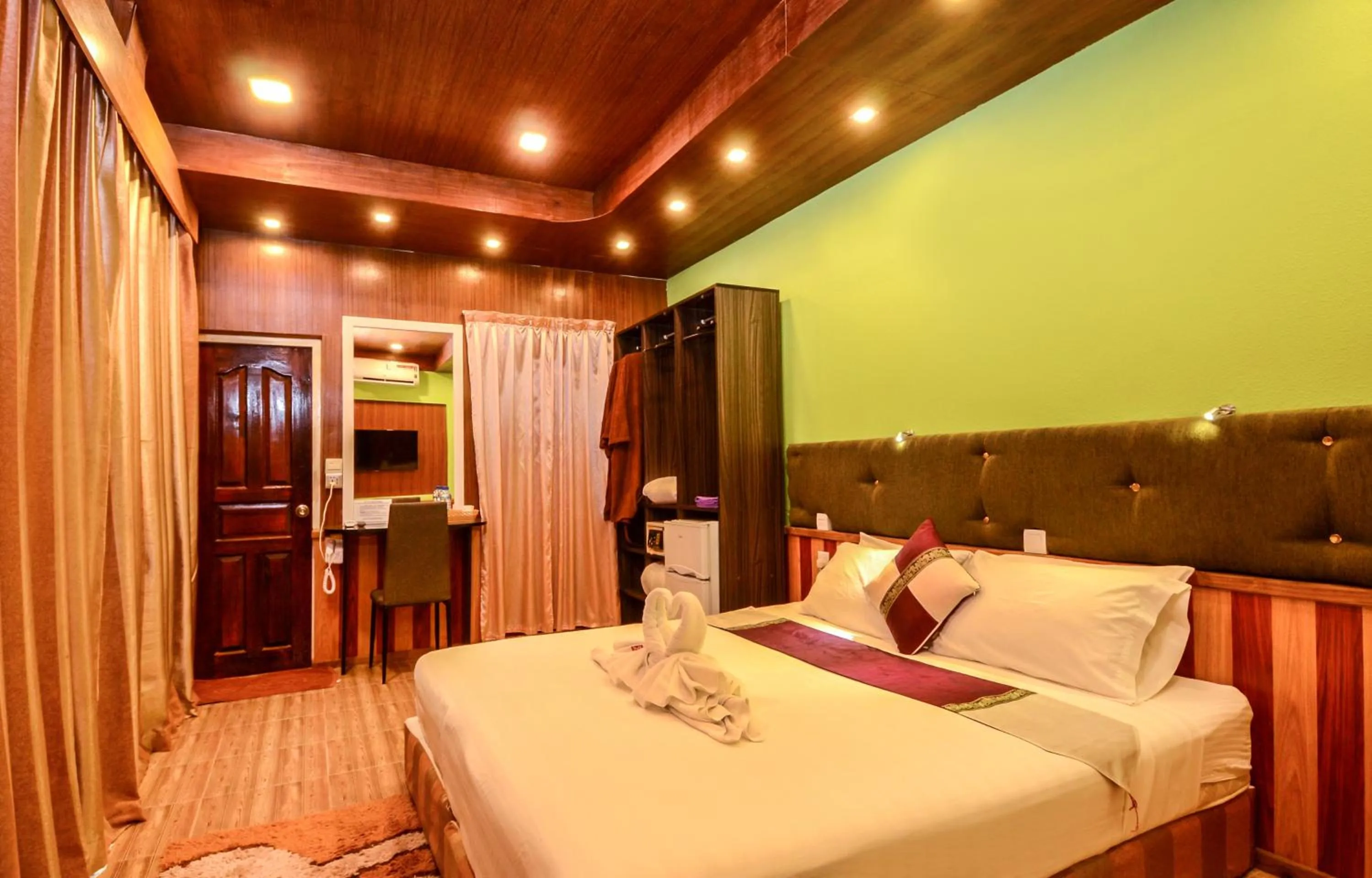 Bed in Summer Villa Guest House