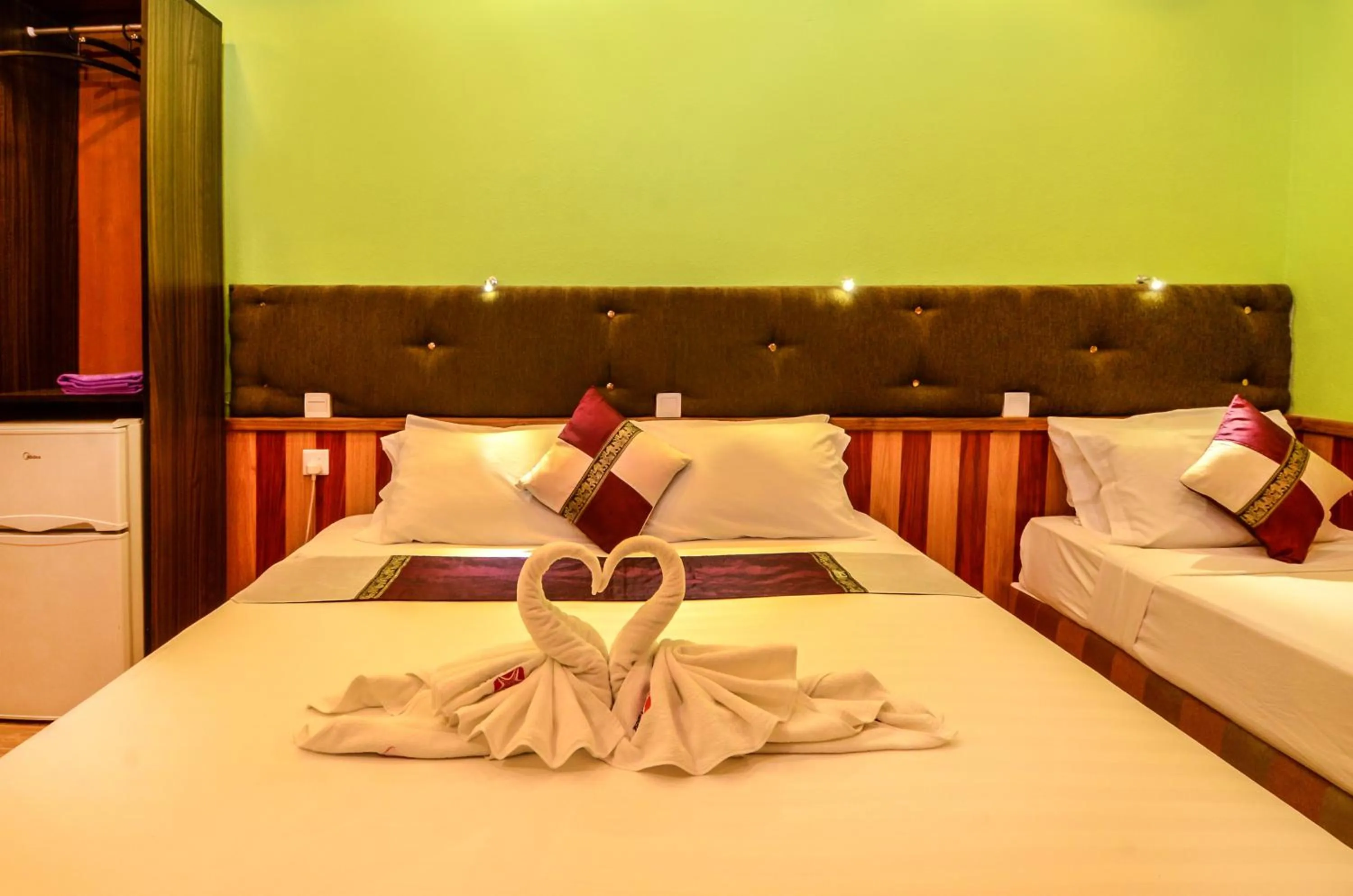 Bed in Summer Villa Guest House