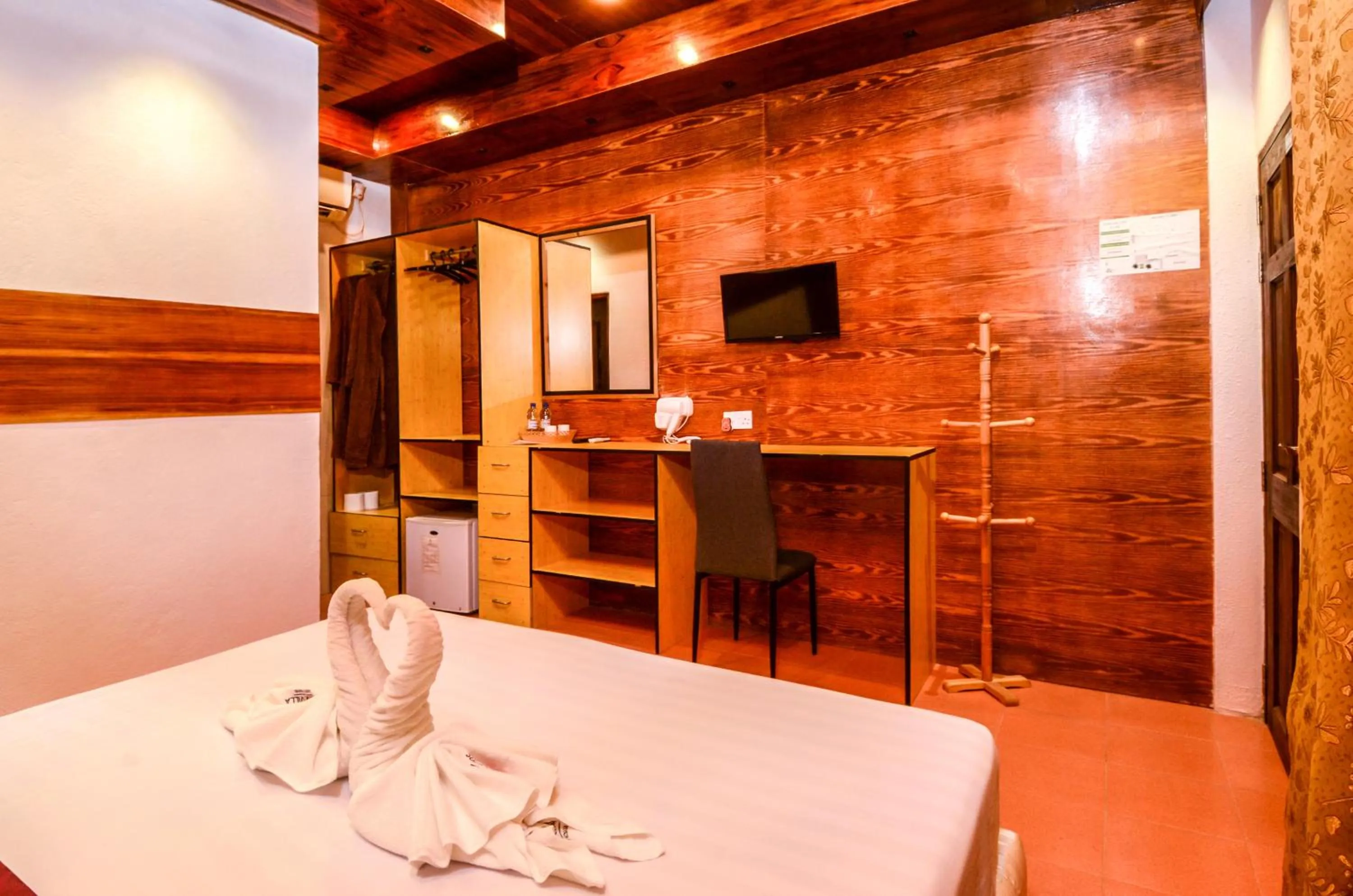 Bed in Summer Villa Guest House