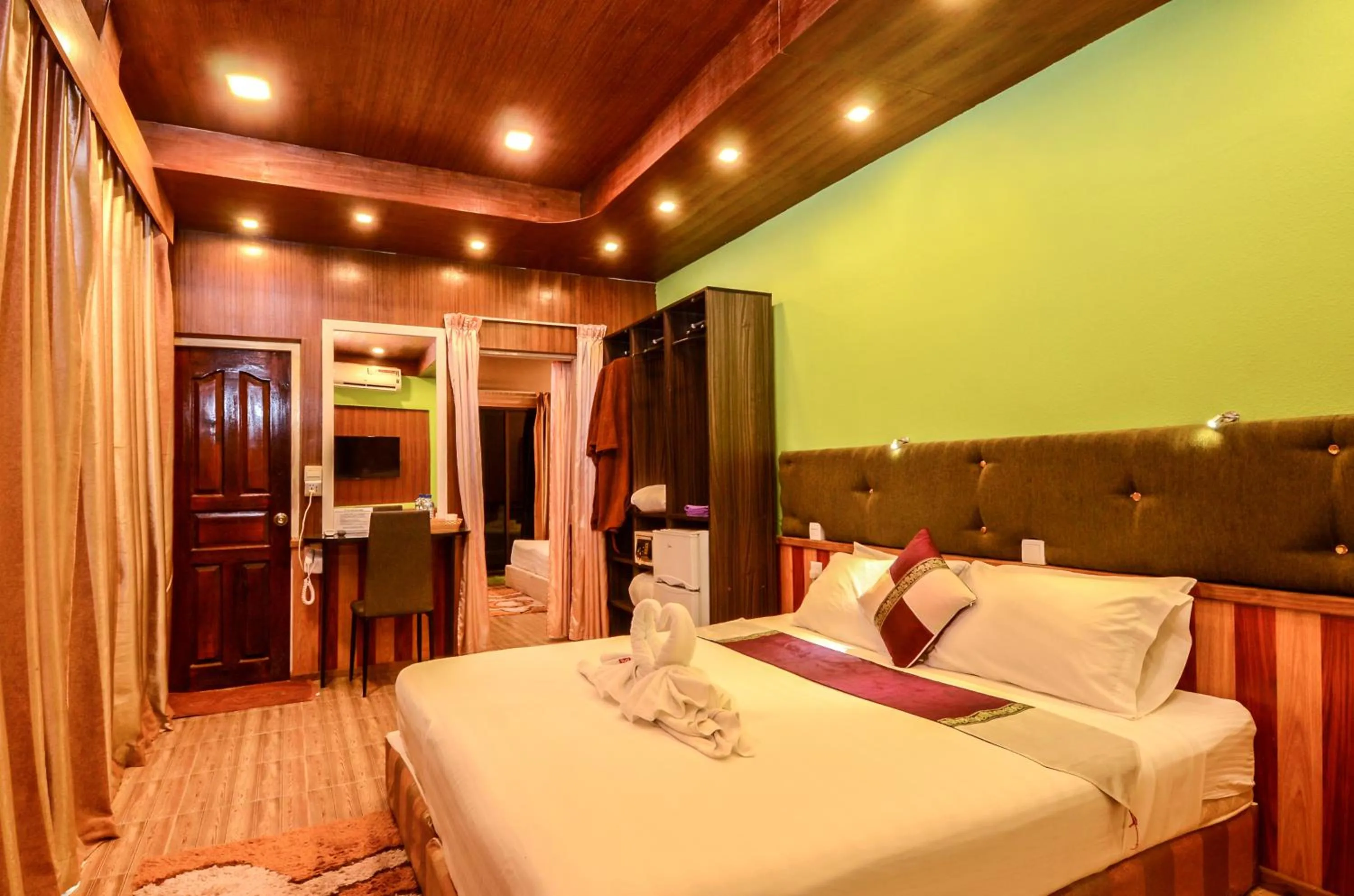 Bed in Summer Villa Guest House