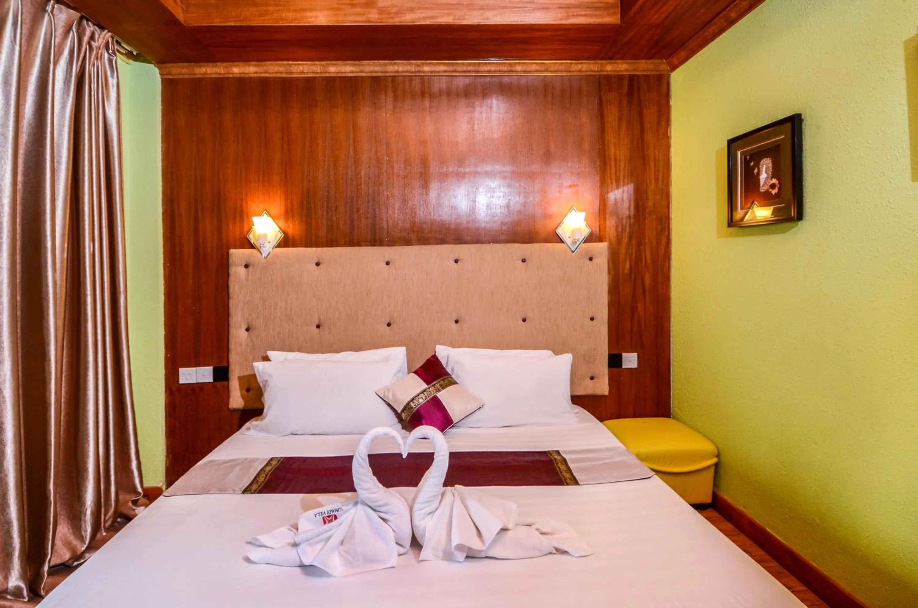 Bed in Summer Villa Guest House