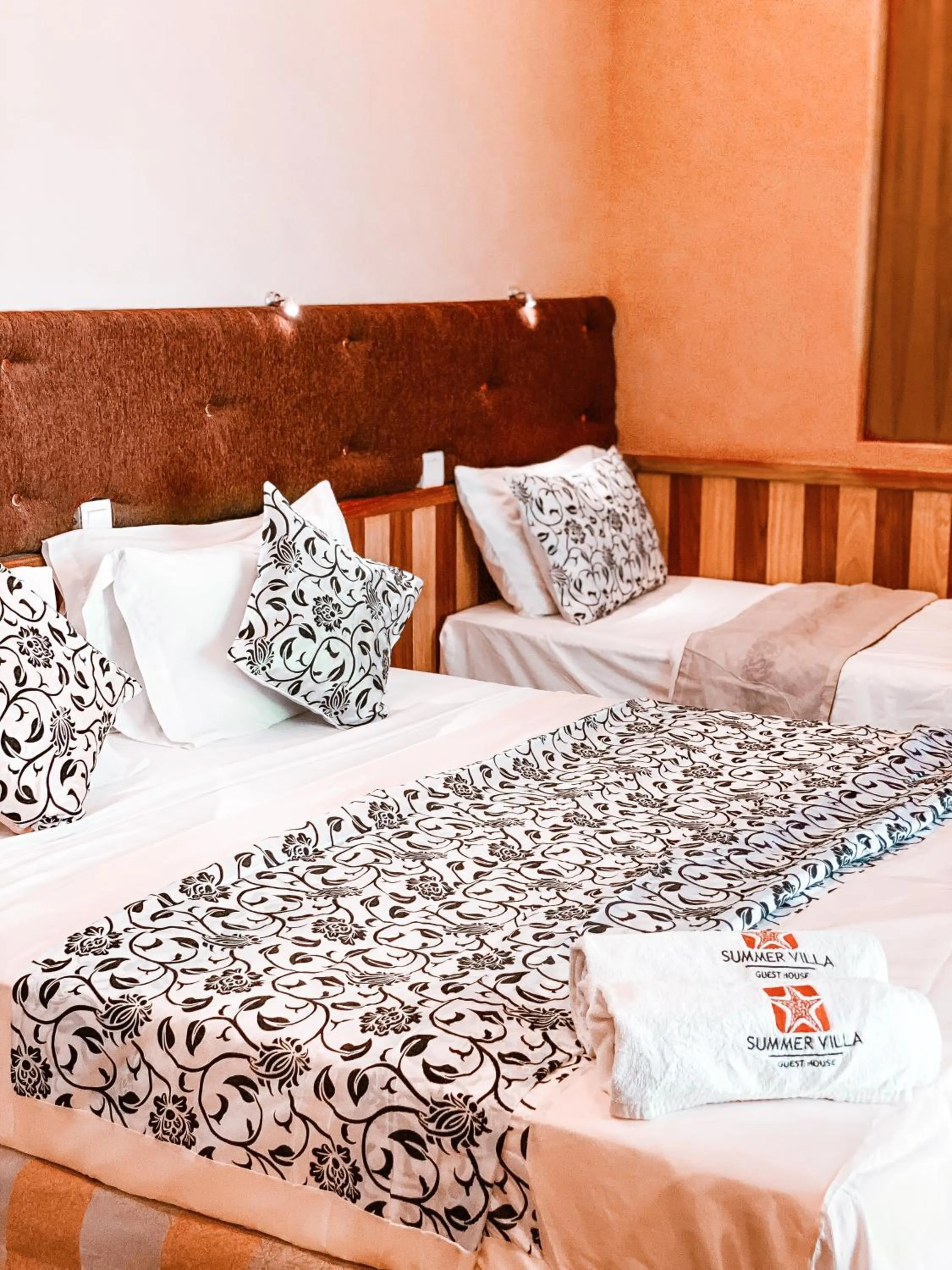 Bed in Summer Villa Guest House