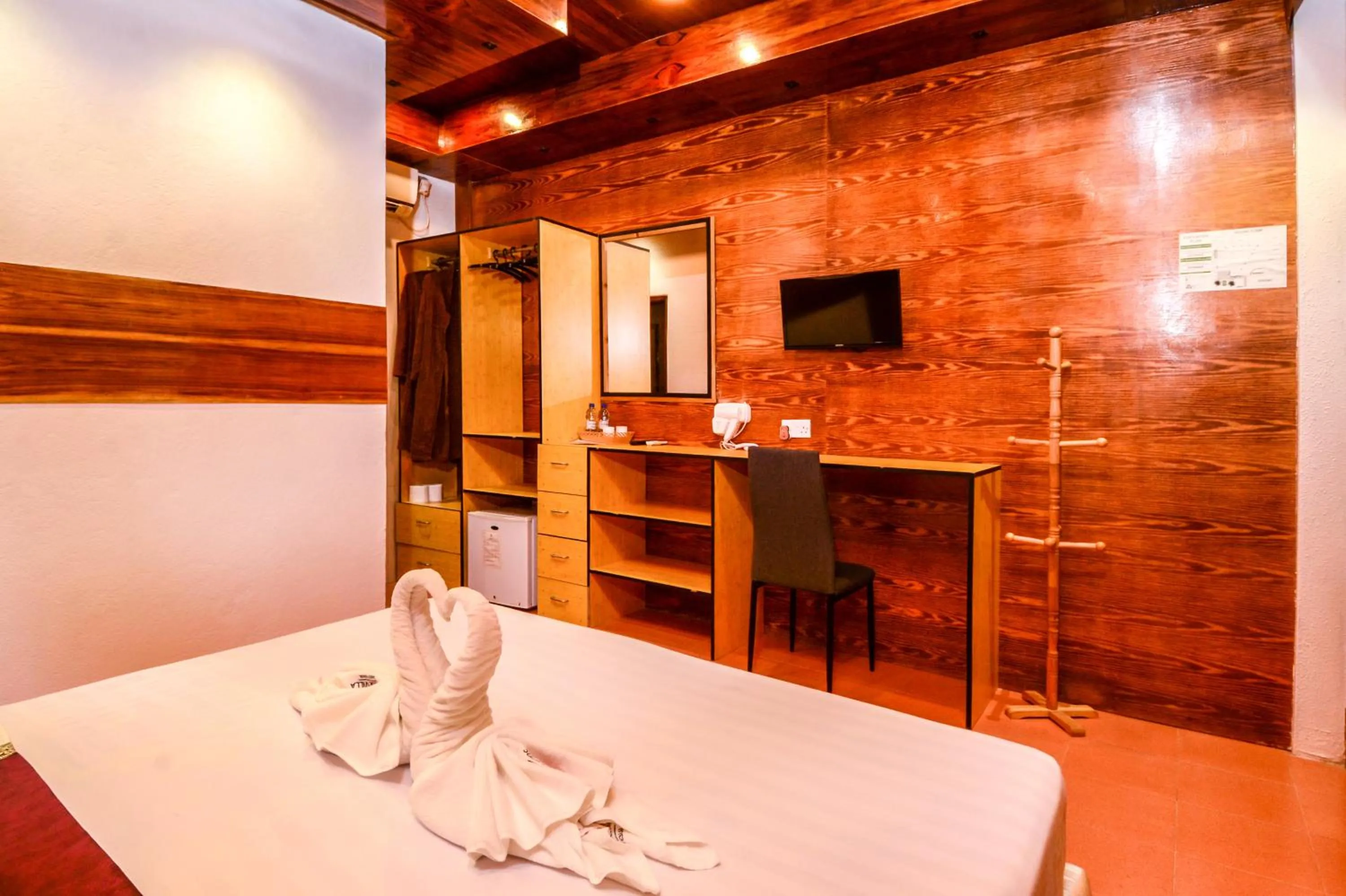 Bed in Summer Villa Guest House