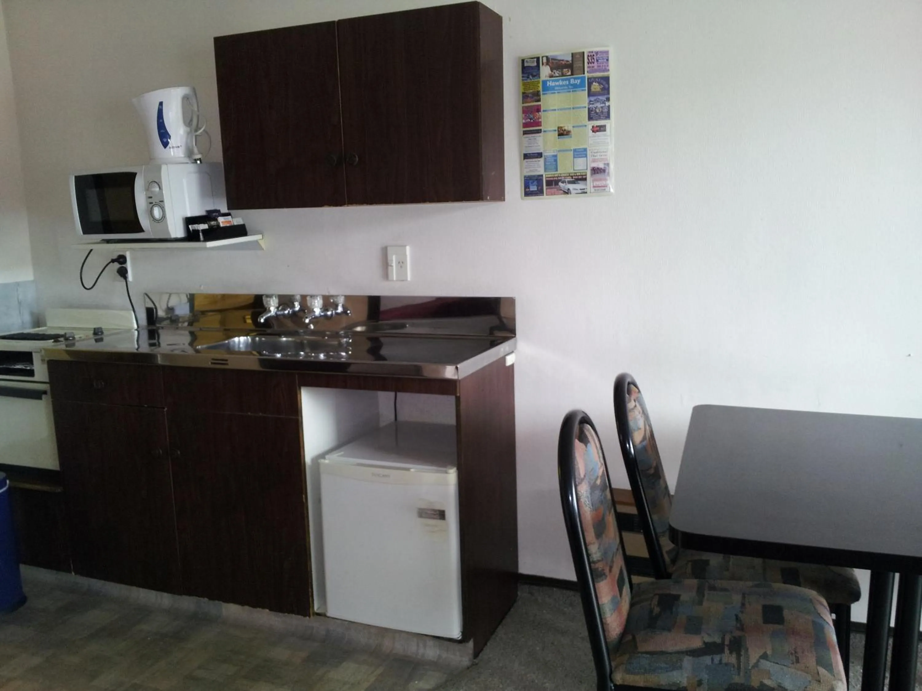 Kitchen or kitchenette in Ace High Motor Inn