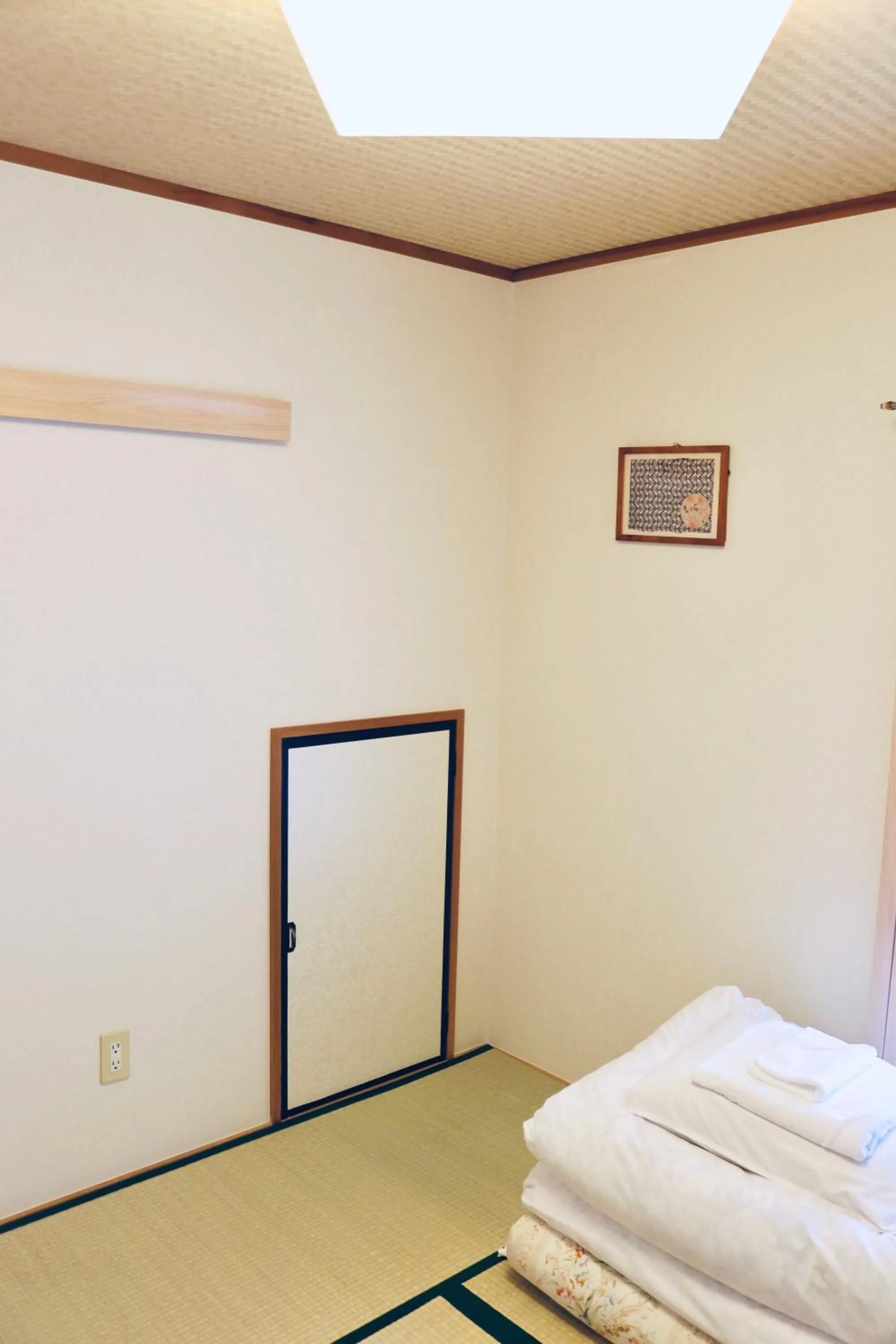 Bed in Ikoi-no-Ie Guesthouse