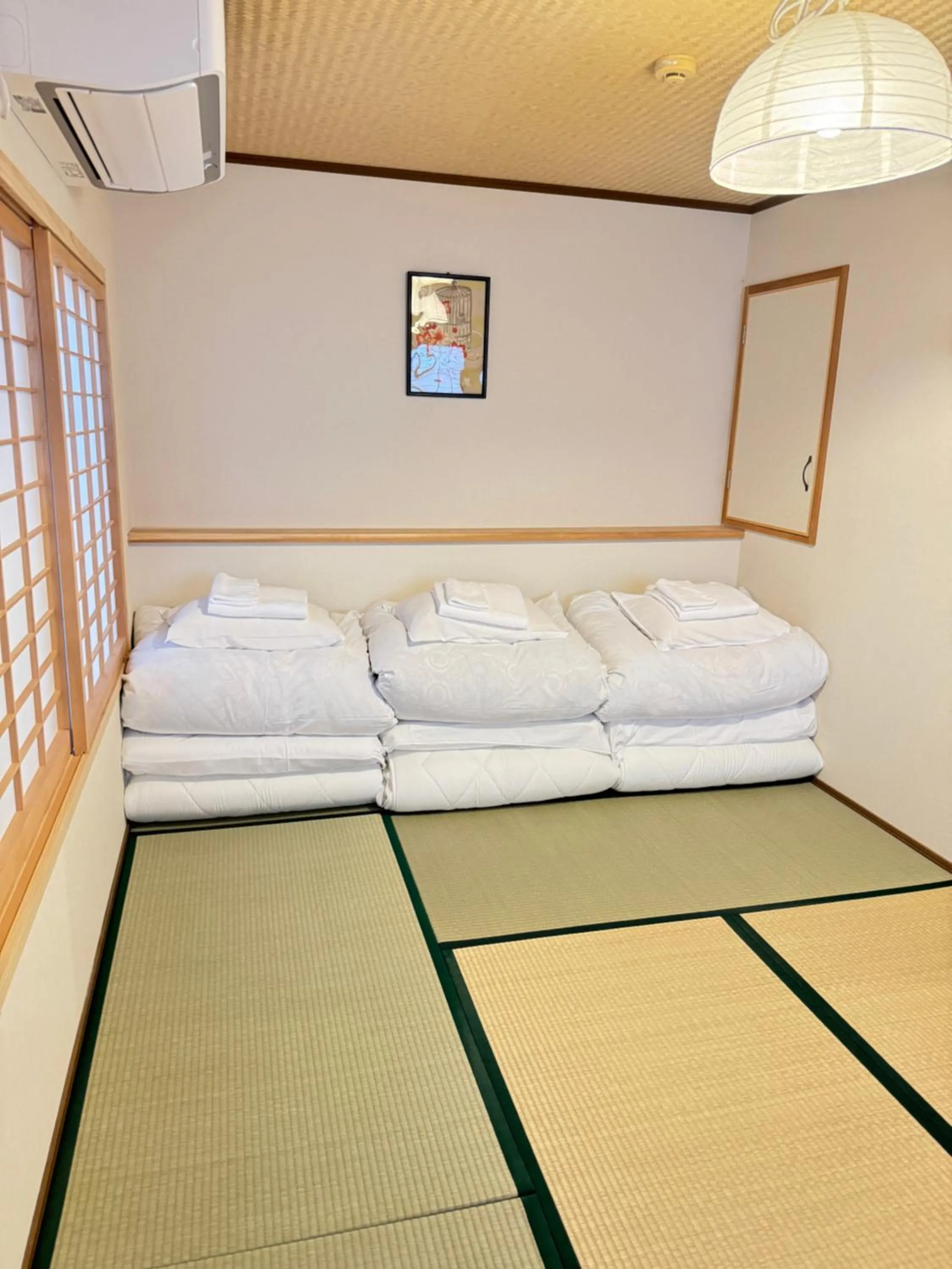 Bed in Ikoi-no-Ie Guesthouse