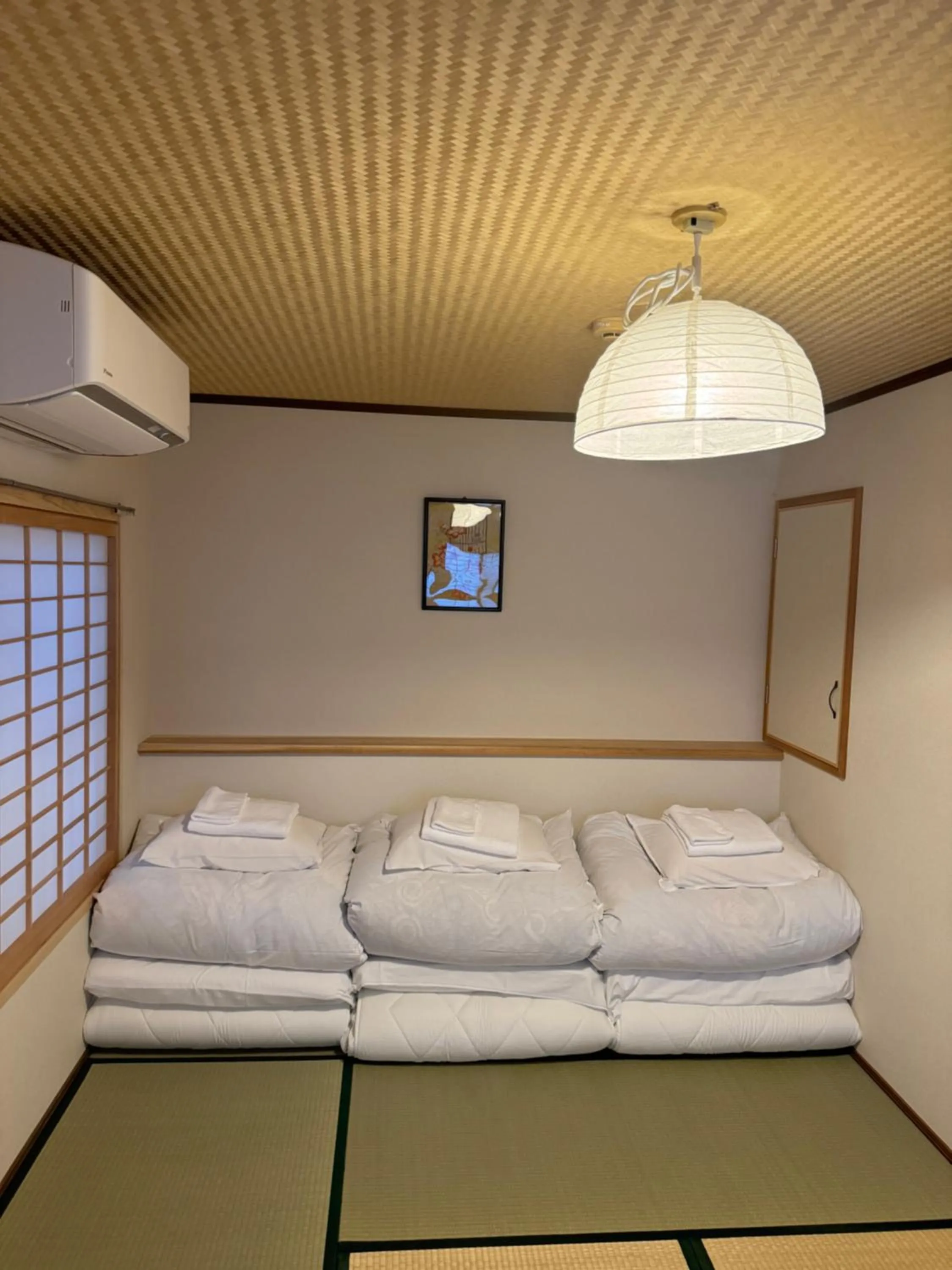 Bed in Ikoi-no-Ie Guesthouse