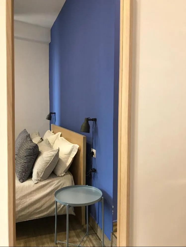 Bed in 2Naples Rooms