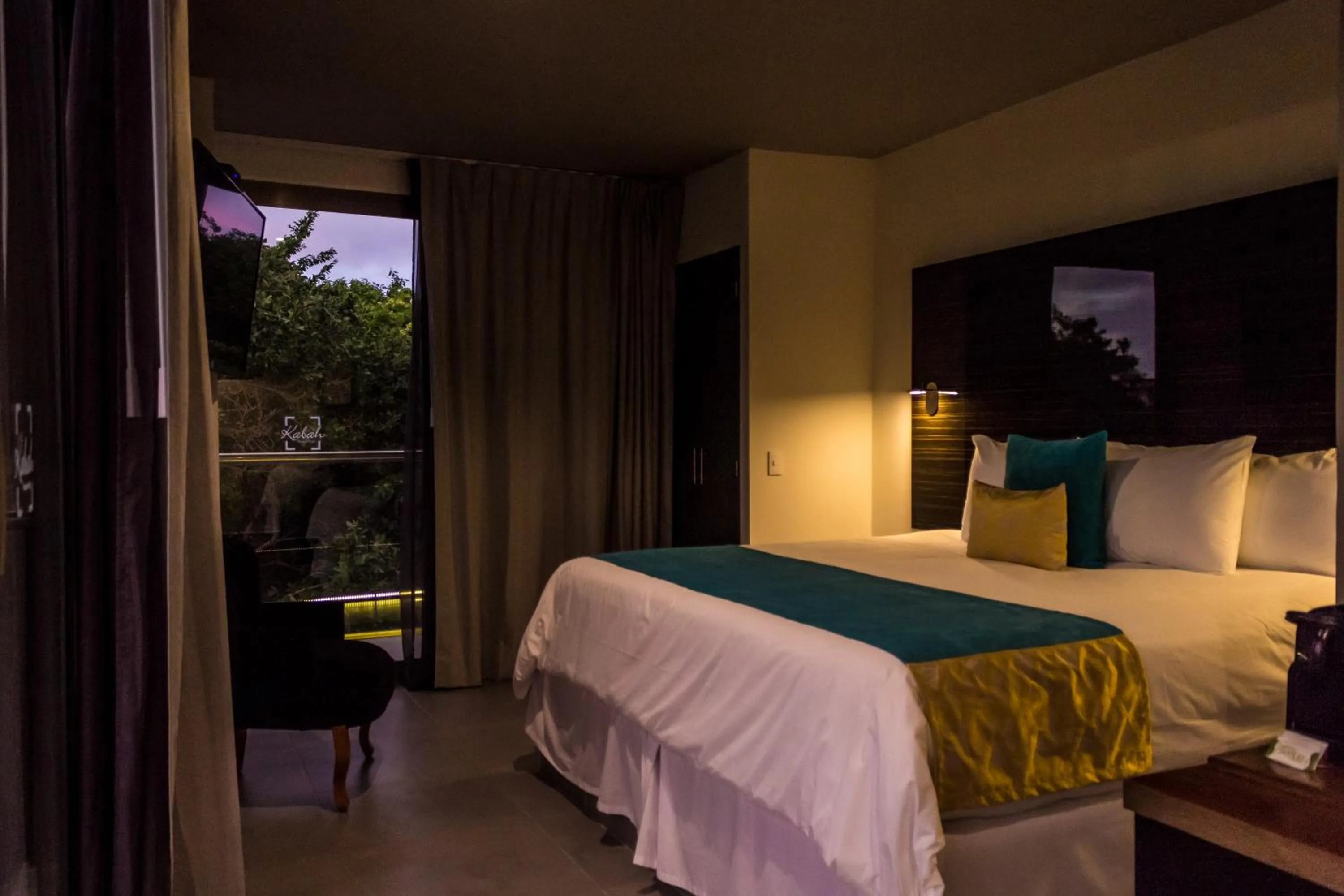 Photo of the whole room, Bed in KABAH Cancun Hotel Boutique