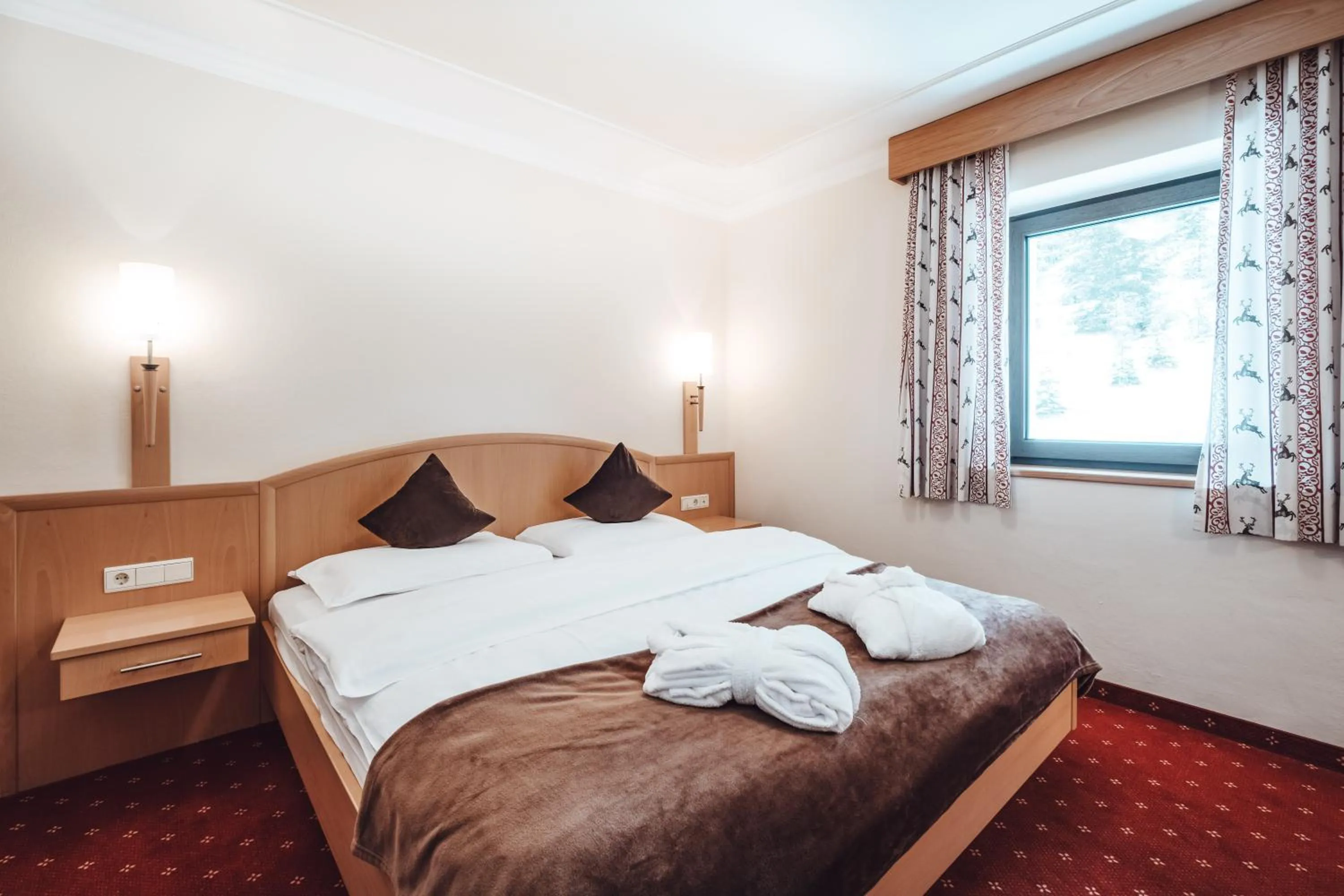 Bed in Hotel Plan de Gralba - das Berghotel