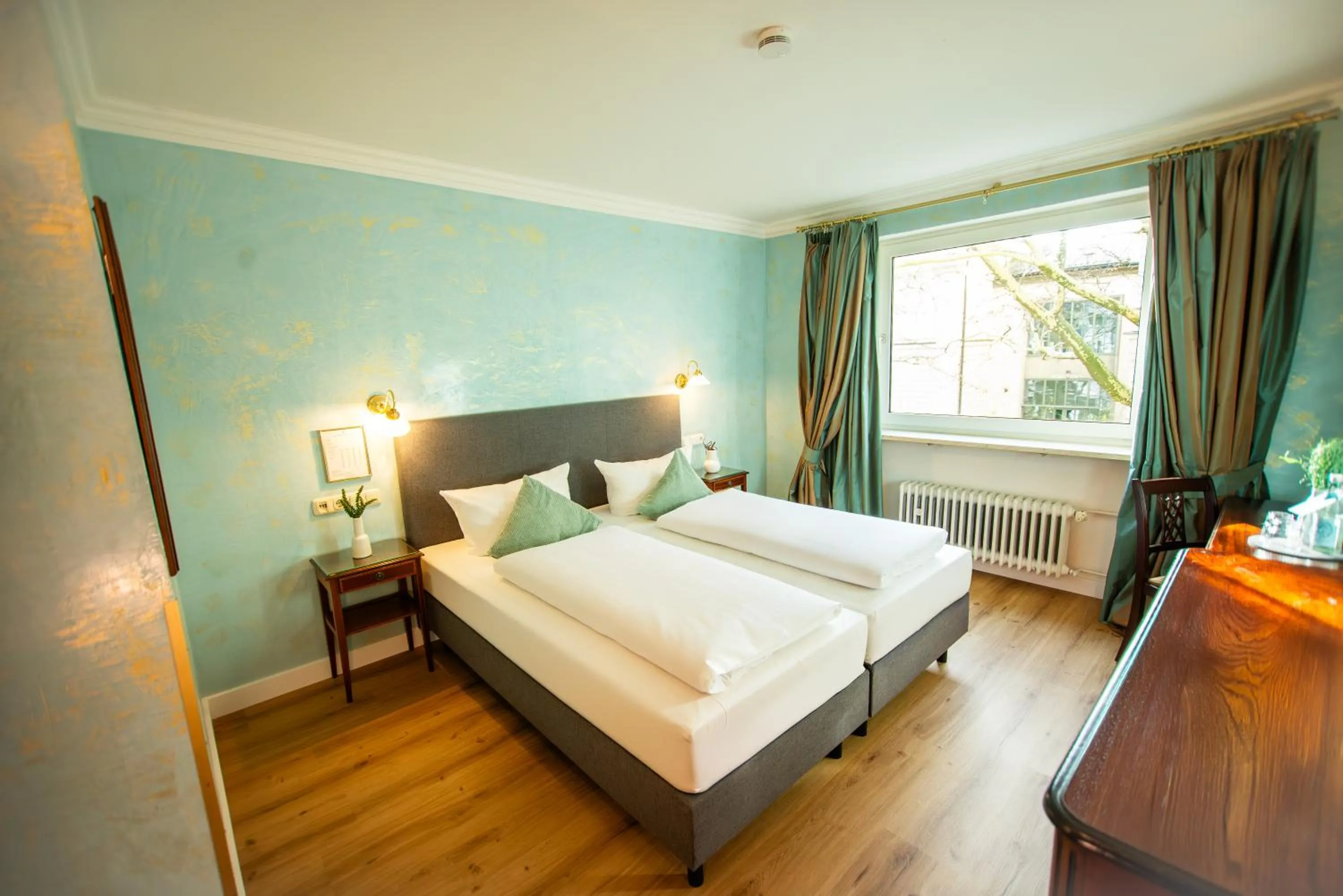 Bed in Hotel Altmünchen by Blattl