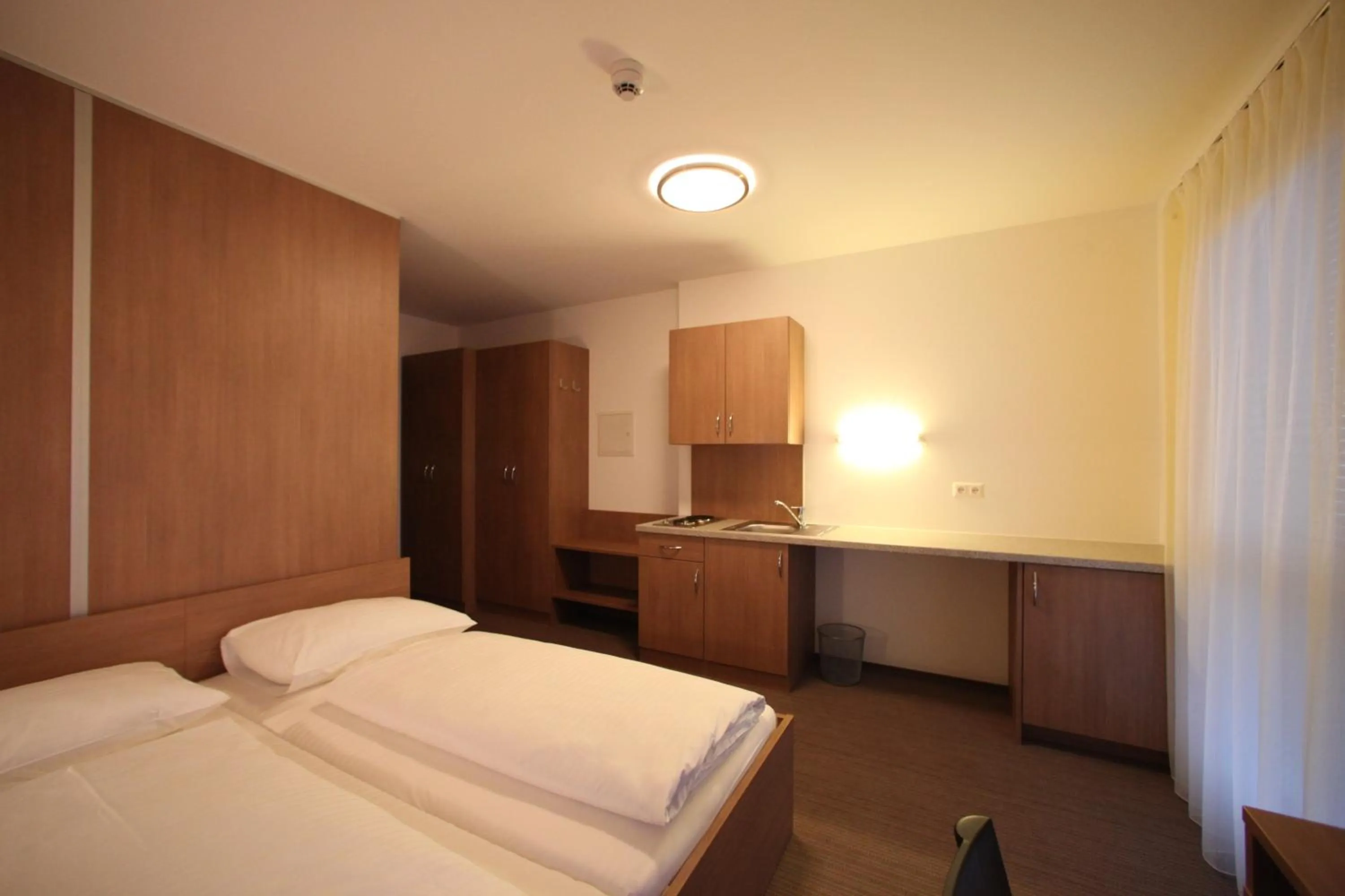 Bedroom, Bed in Fair-Price-Hotel