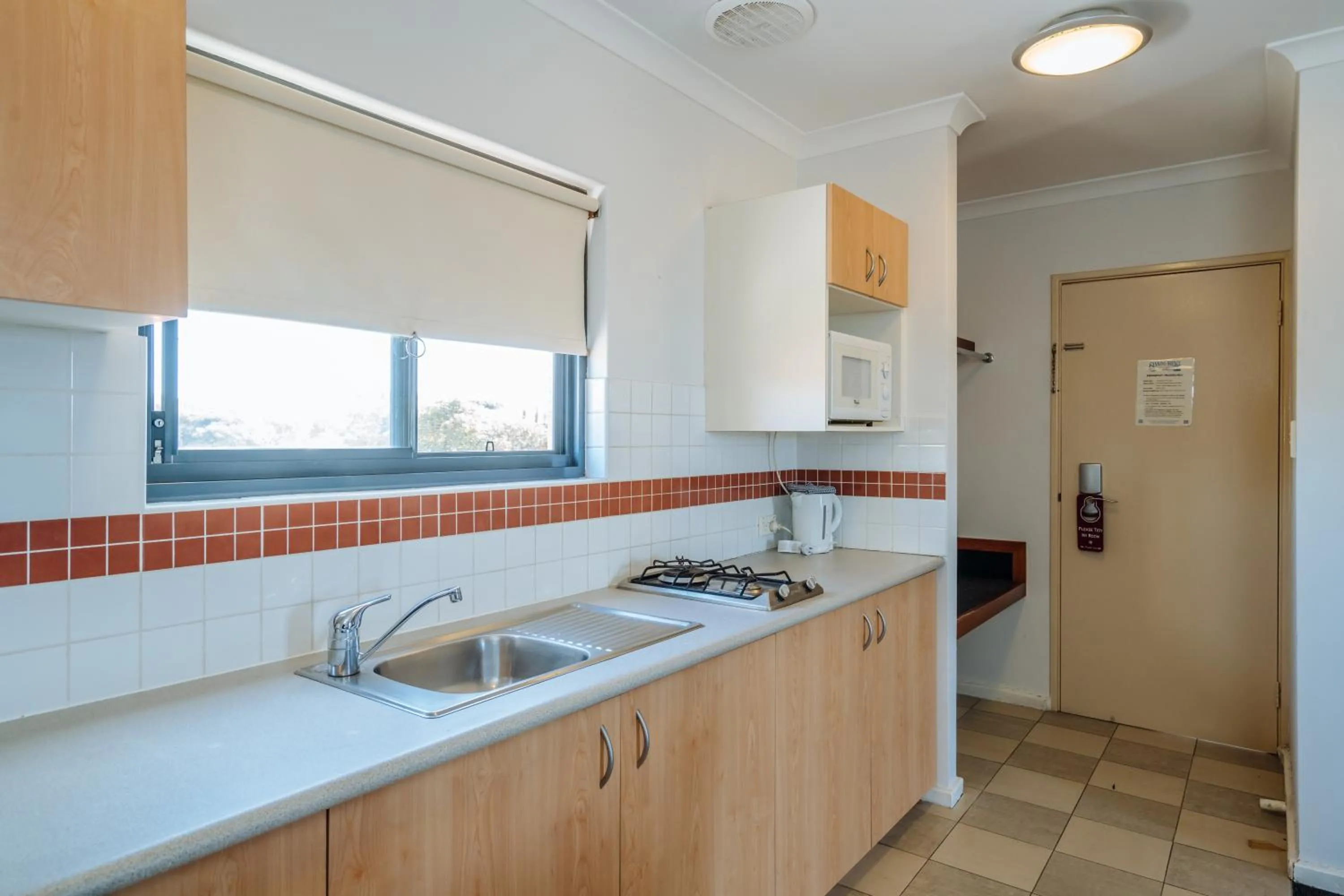 Kitchen or kitchenette in Canning Bridge Auto Lodge