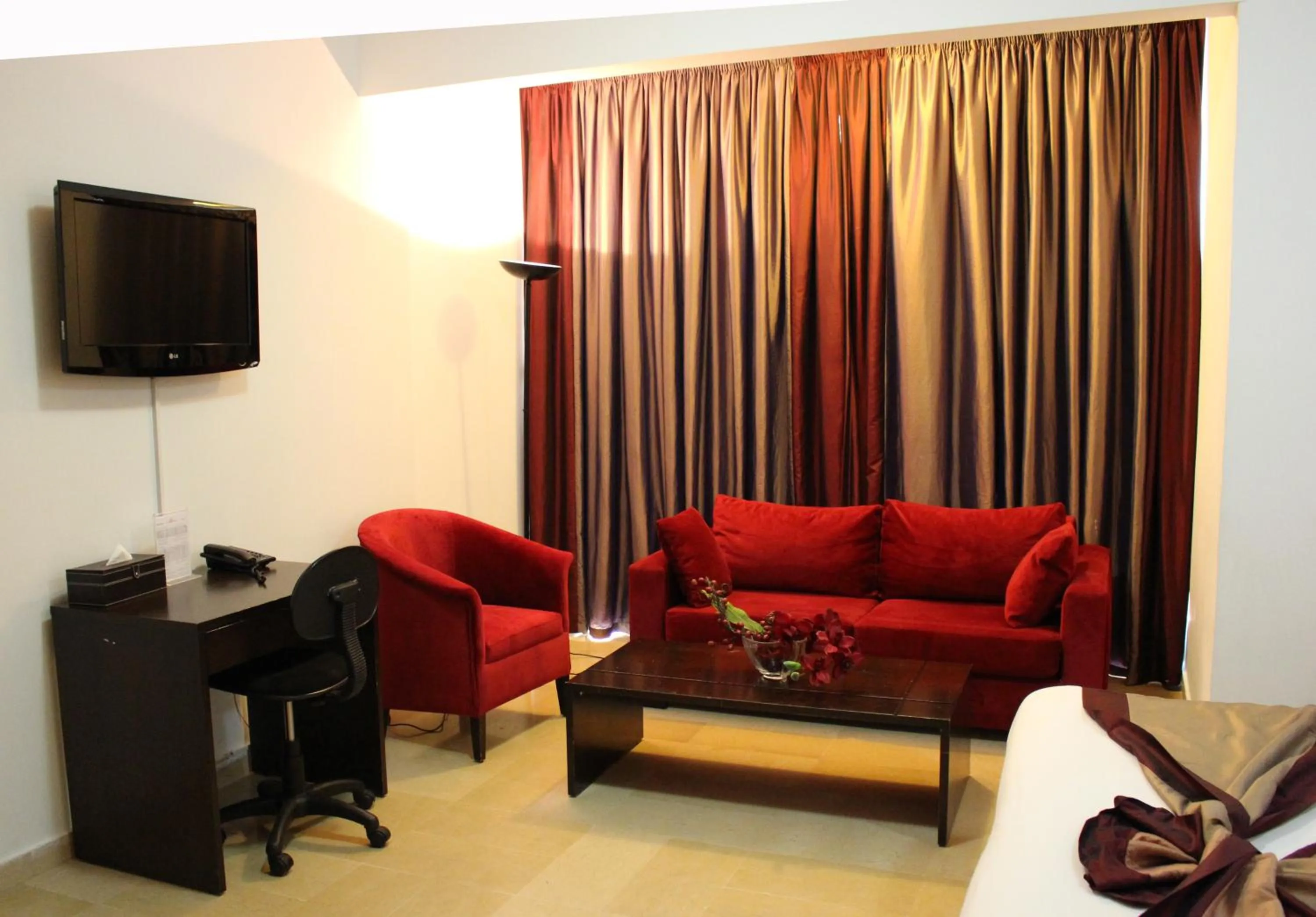 Living room in Bliss 3000 Furnished Studios