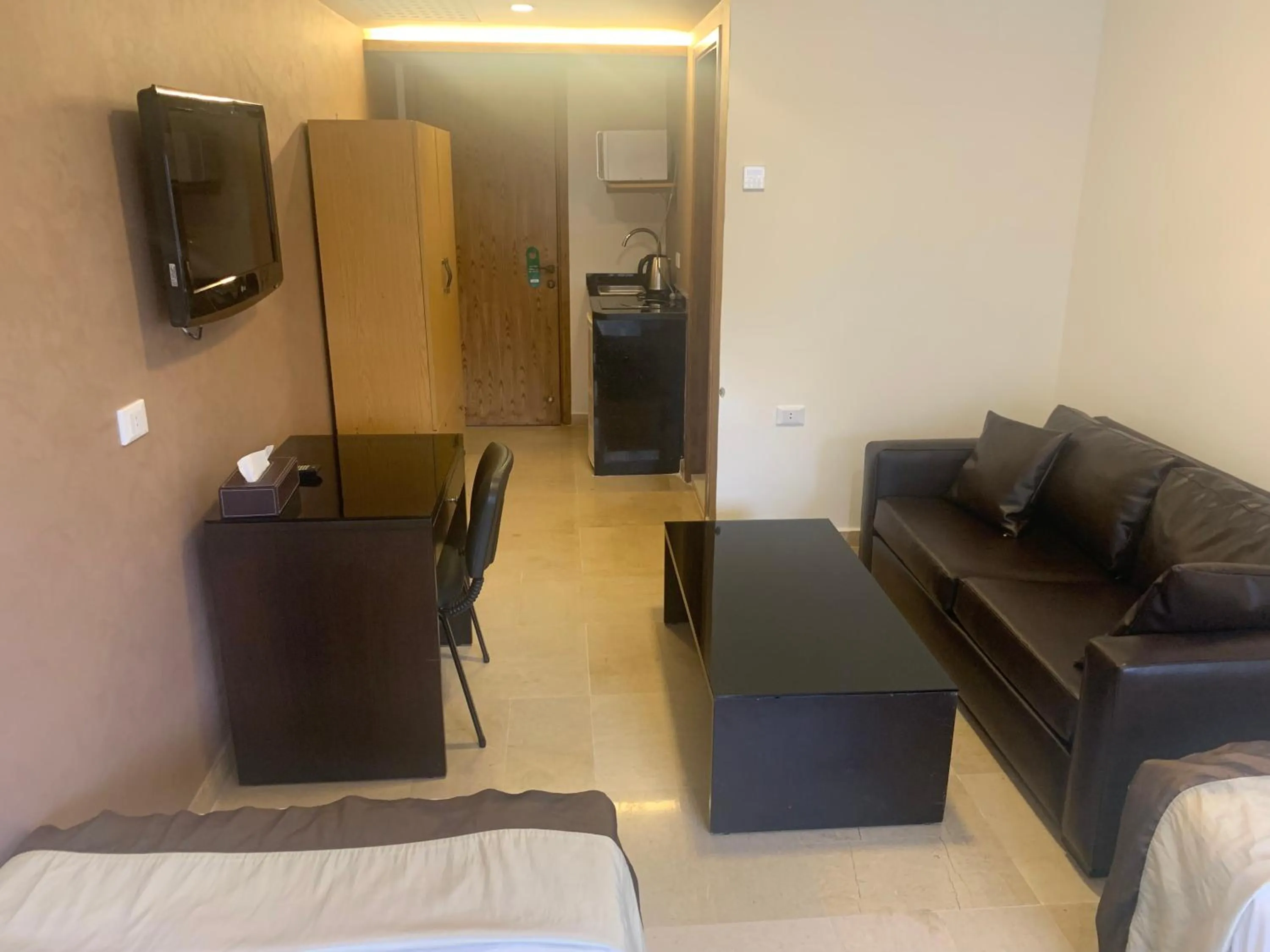 TV and multimedia, Bed in Bliss 3000 Furnished Studios