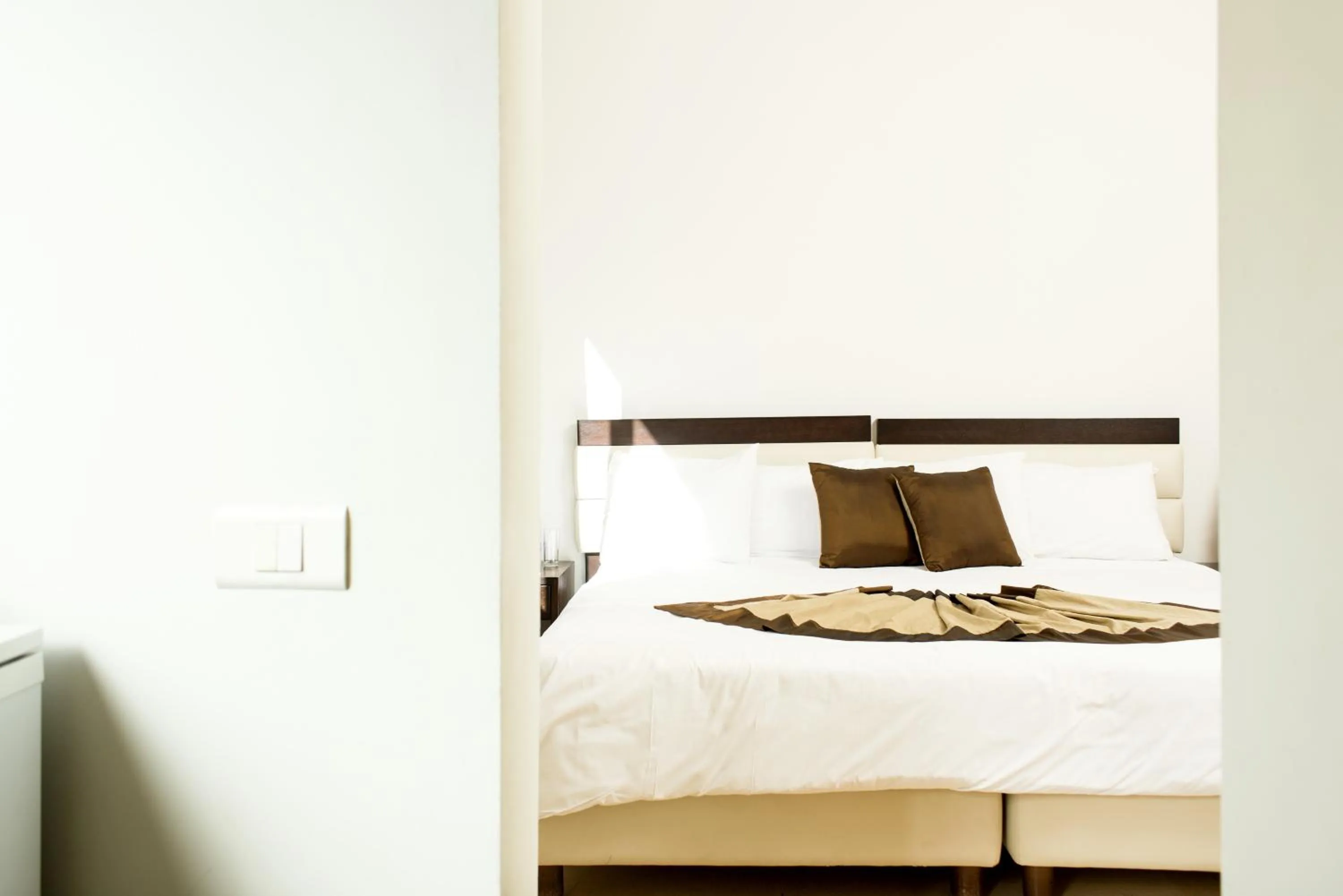 Bed in Bliss 3000 Furnished Studios