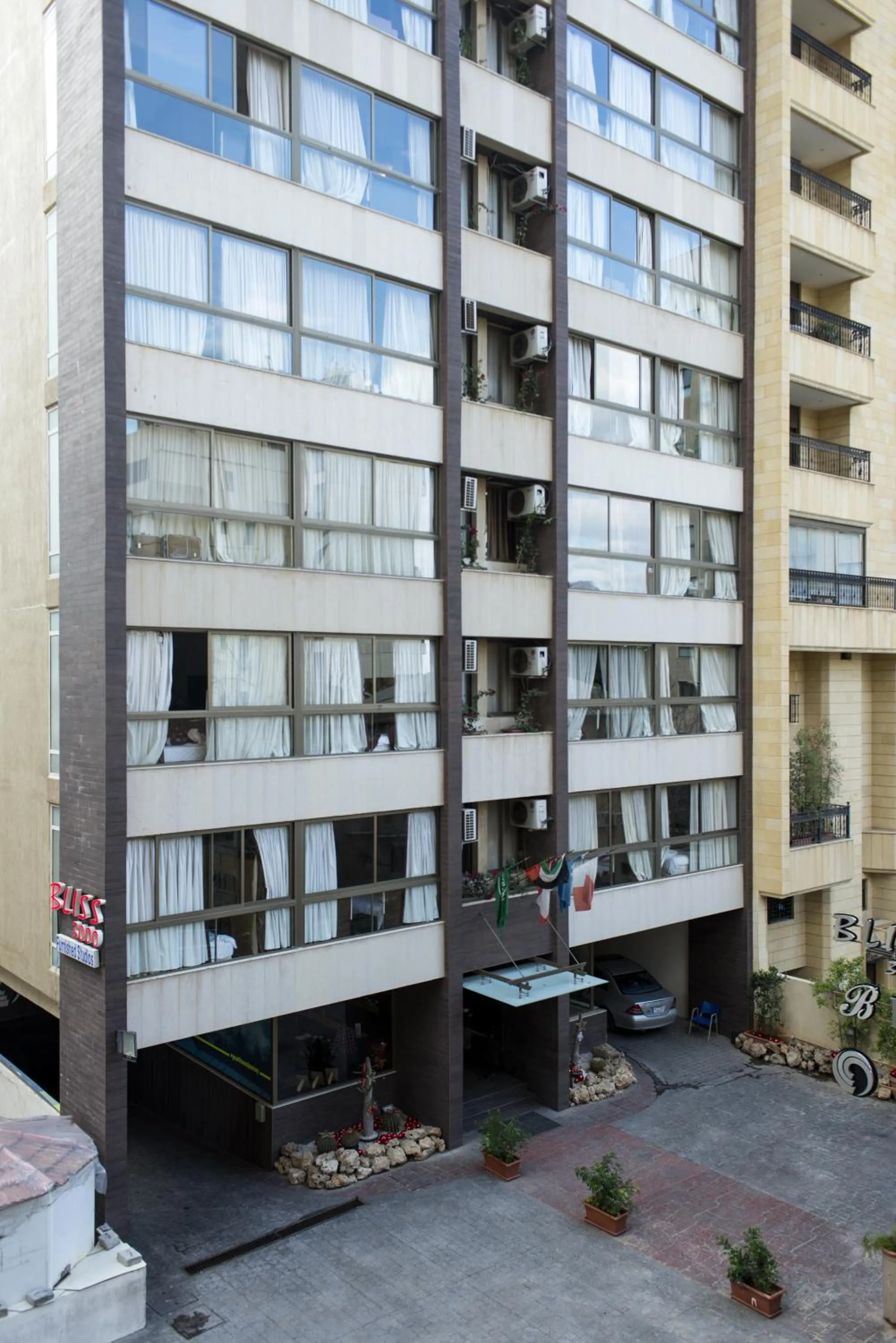 Property building in Bliss 3000 Furnished Studios