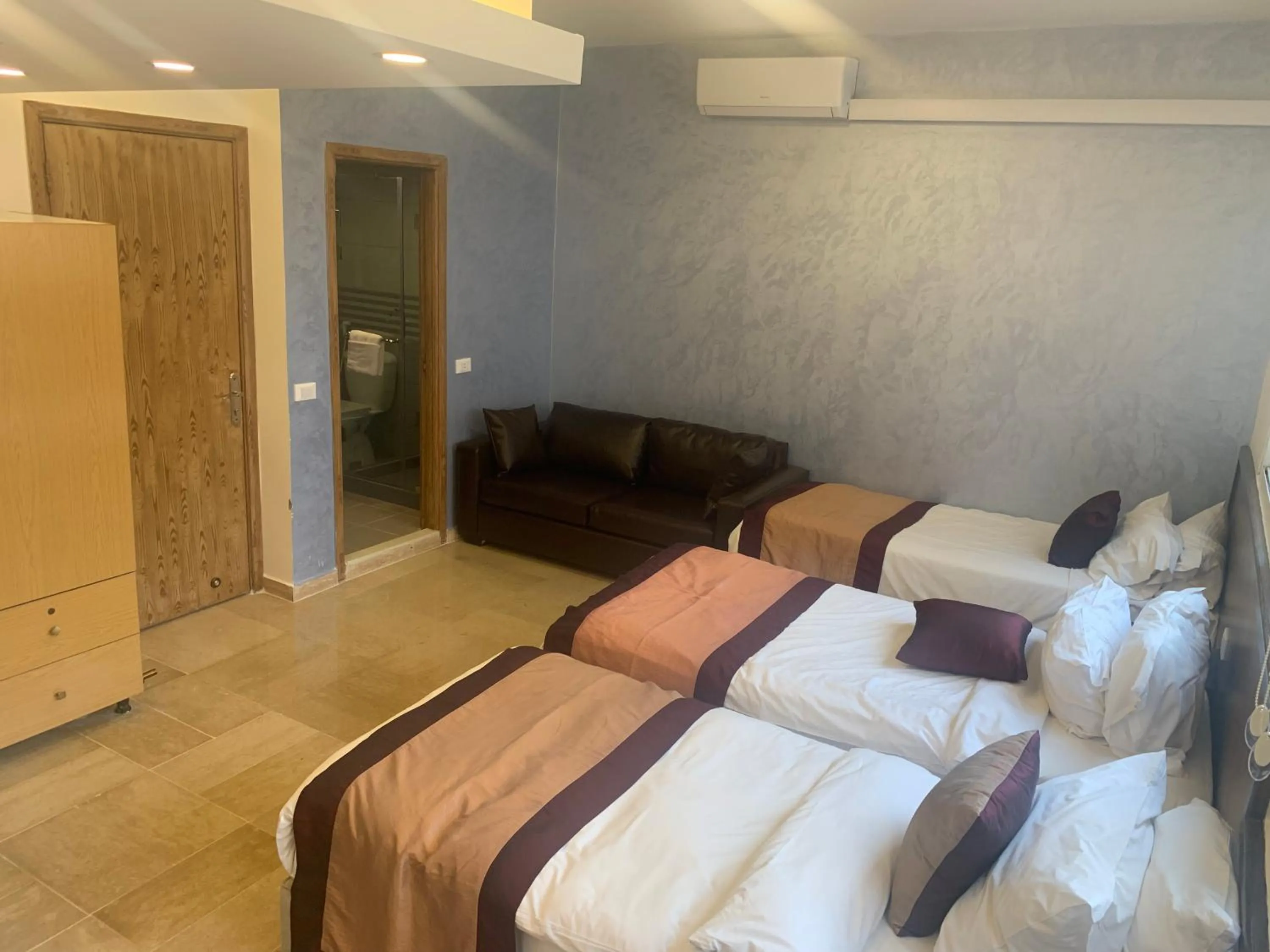 Bed in Bliss 3000 Furnished Studios