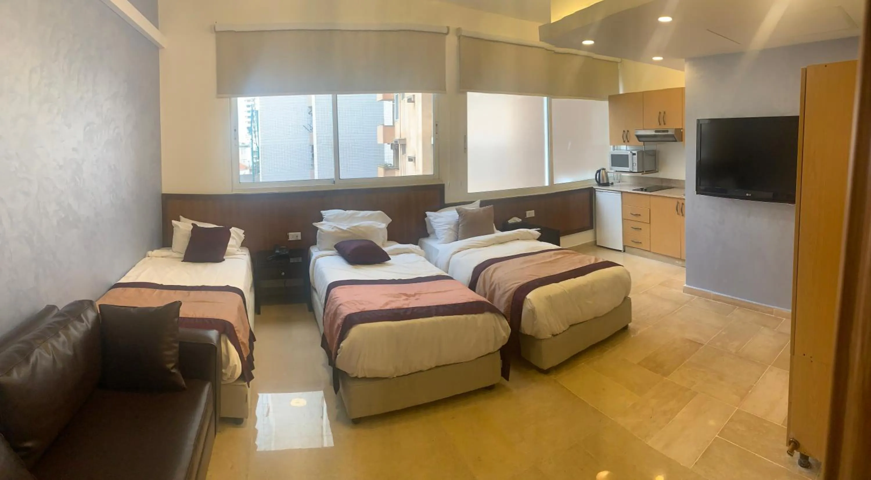 Bed in Bliss 3000 Furnished Studios