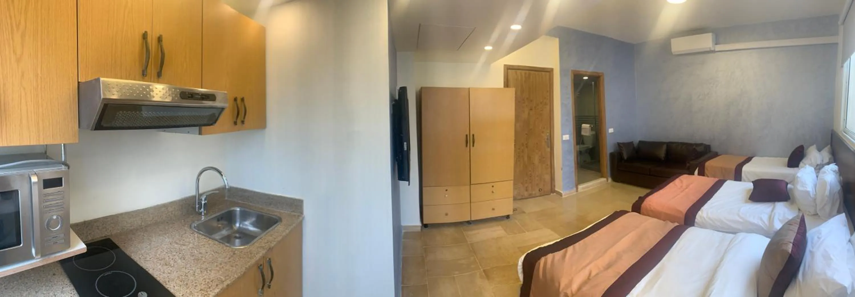 Bed in Bliss 3000 Furnished Studios