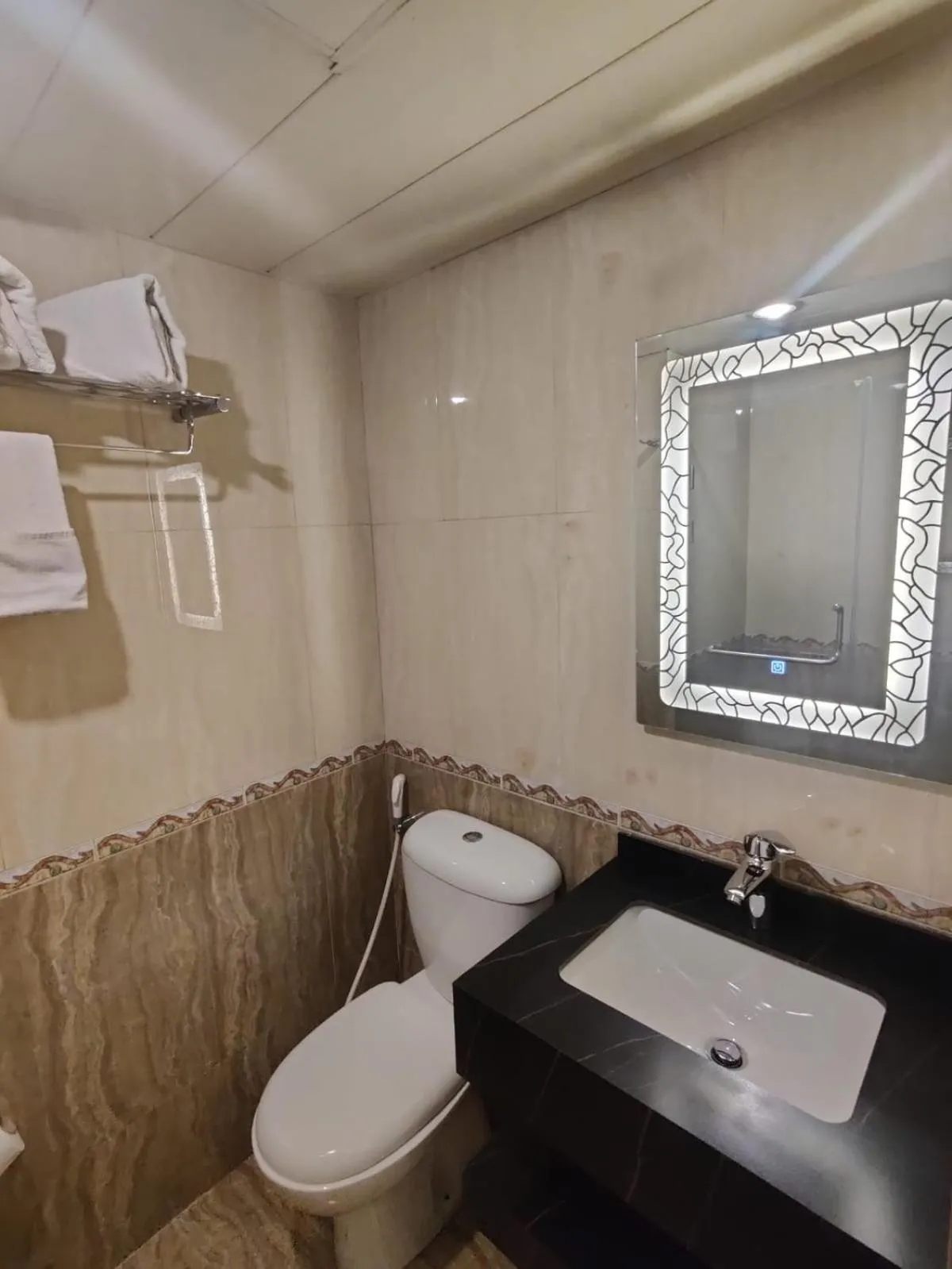 Bathroom in Bliss 3000 Furnished Studios