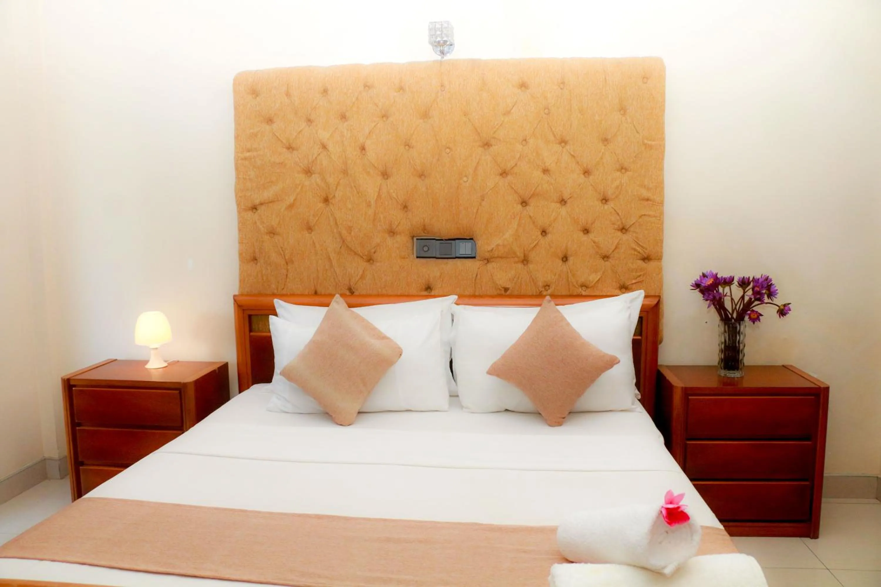 Bed in Queens Beach Hotel