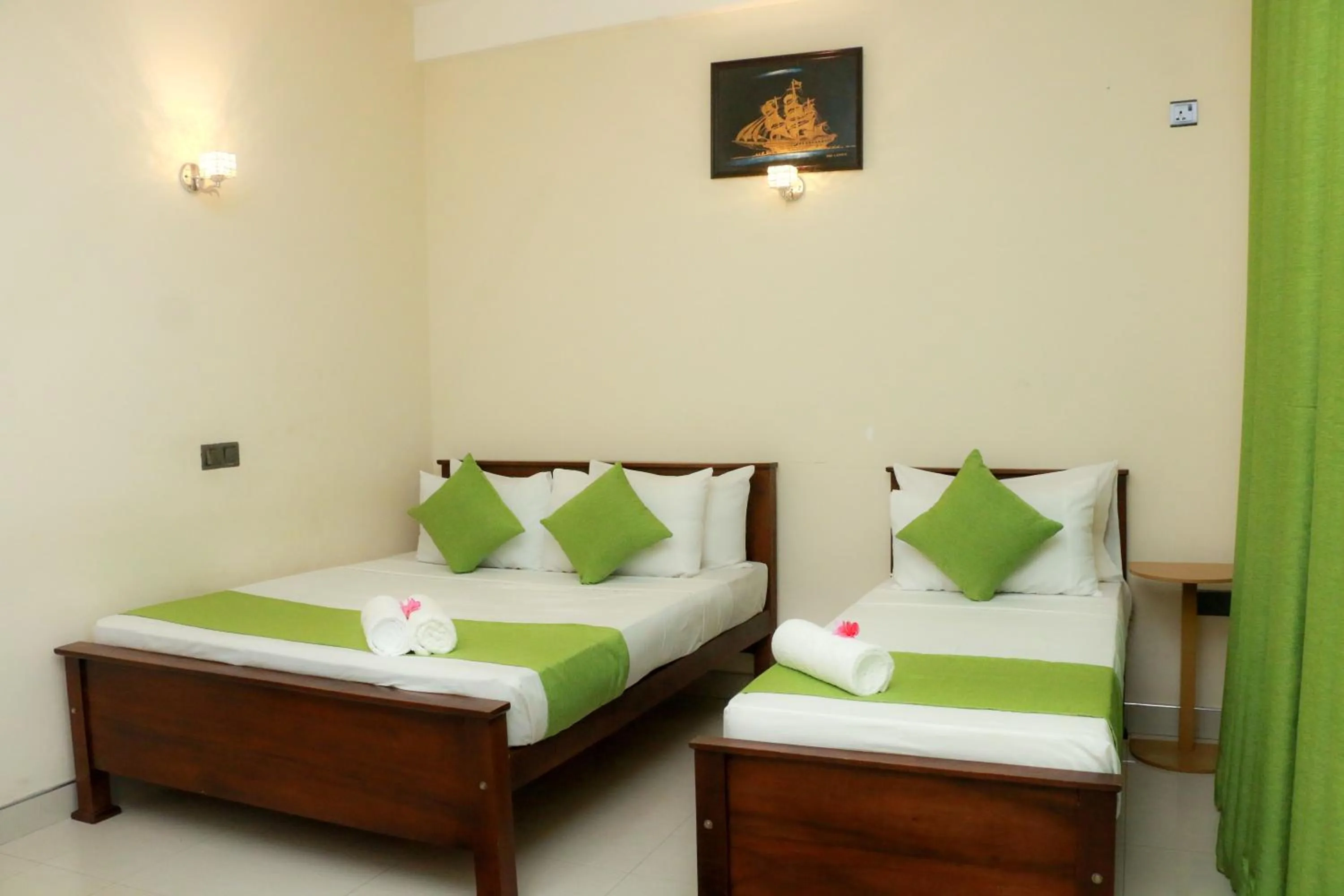 Bed in Queens Beach Hotel