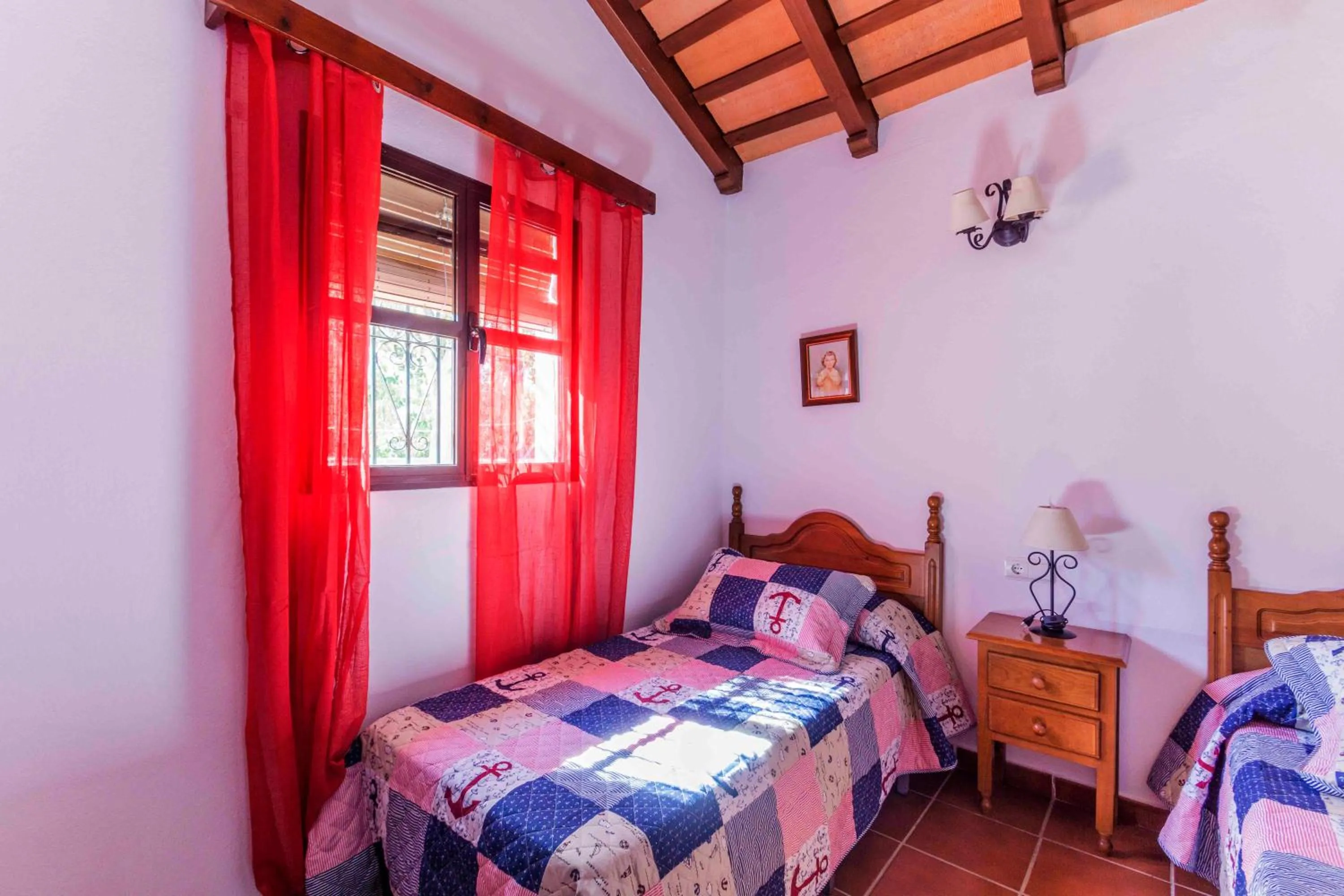 Bed in Vivienda Rural Atlántico Sur & Familias