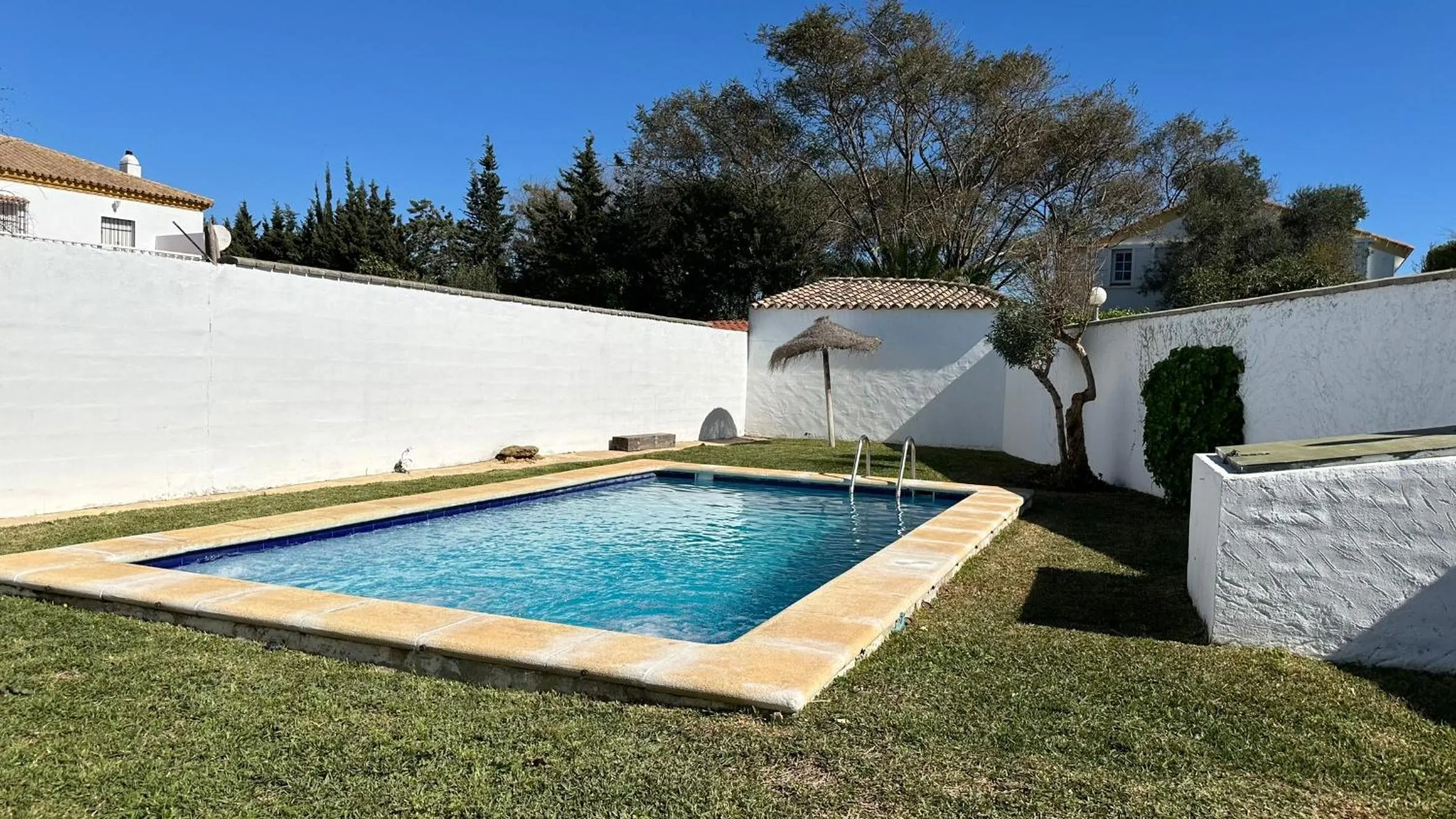 Swimming pool in Vivienda Rural Atlántico Sur & Familias