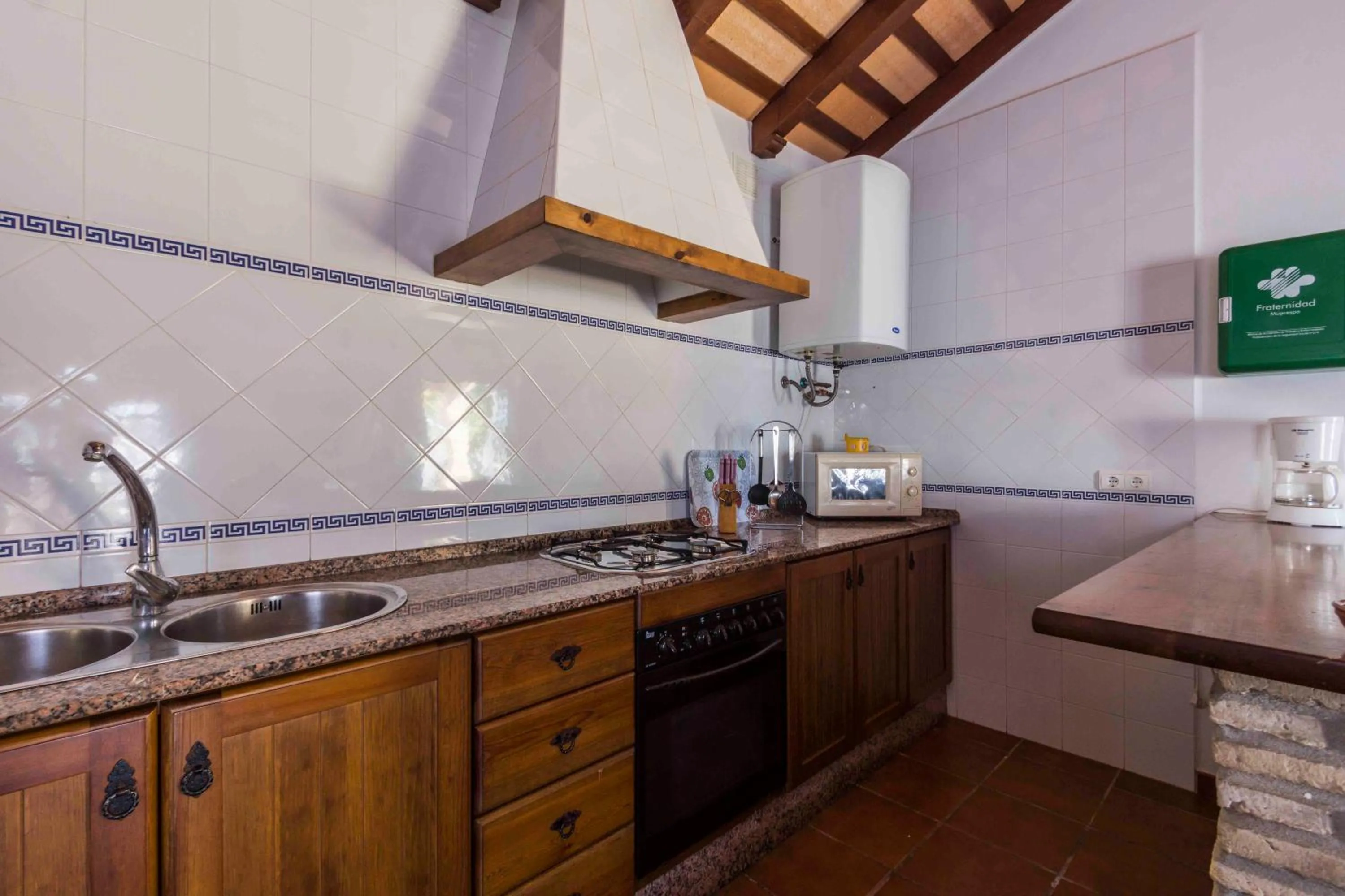 Kitchen or kitchenette in Vivienda Rural Atlántico Sur & Familias