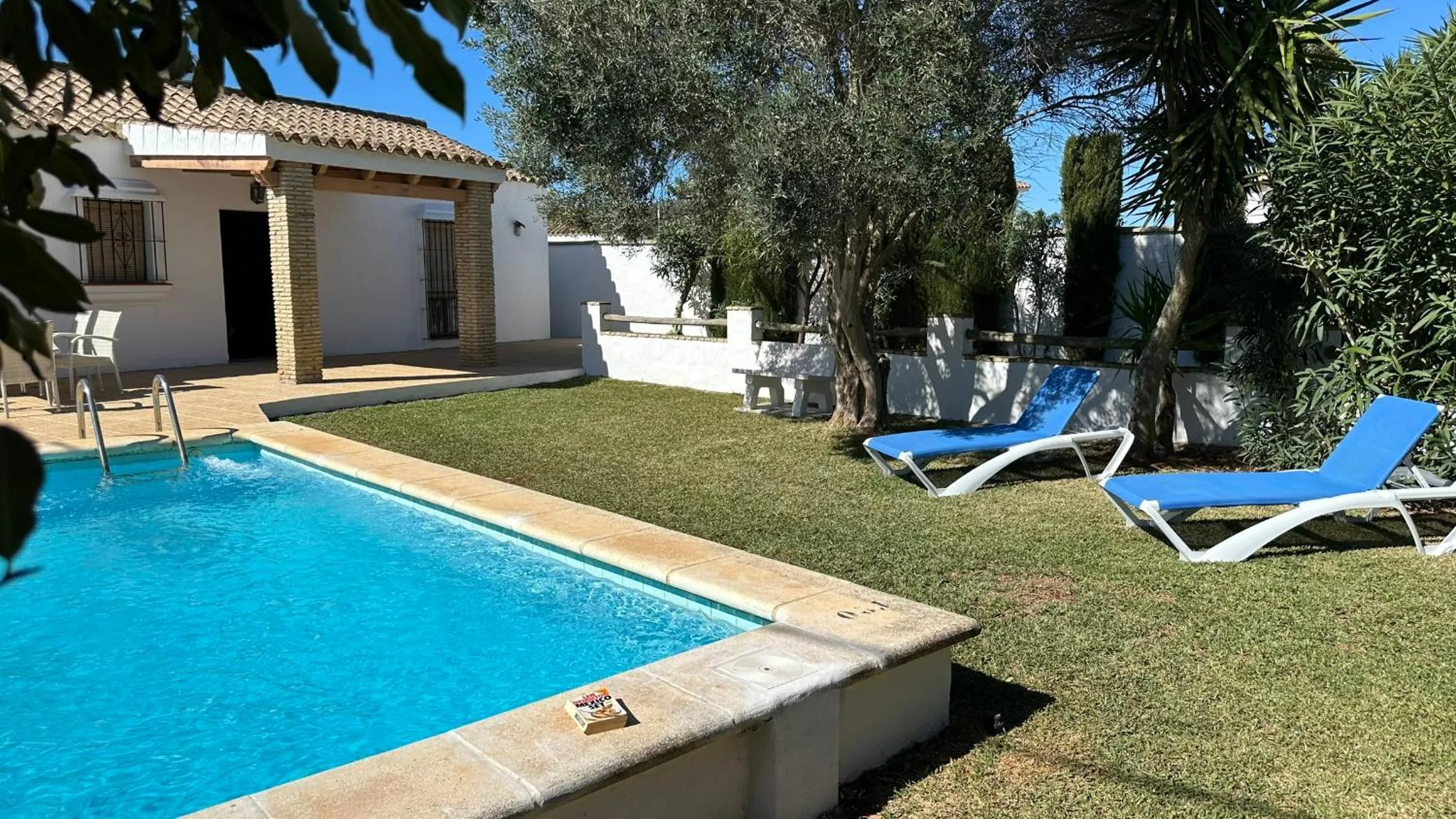 Swimming pool in Vivienda Rural Atlántico Sur & Familias