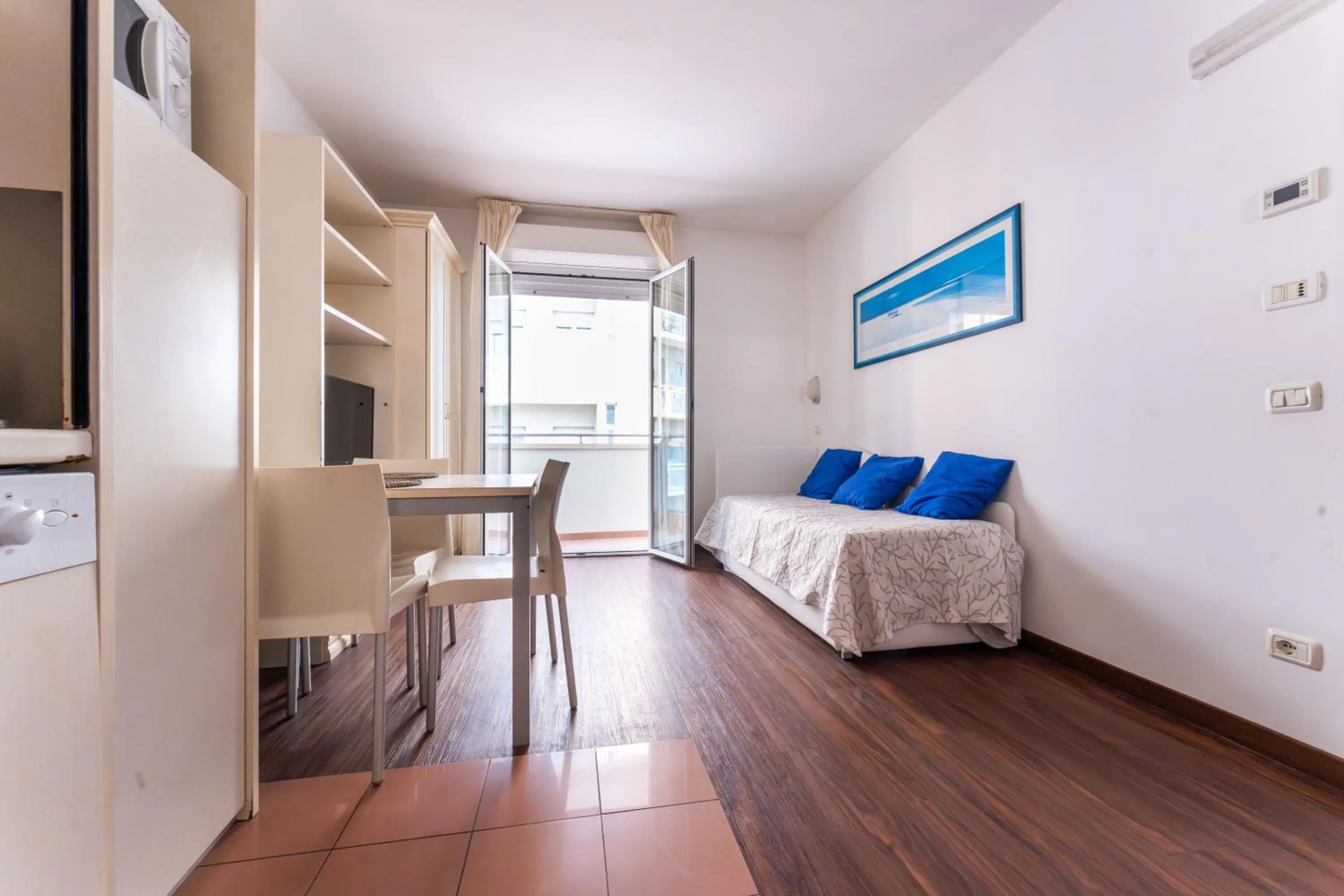 Living room, Bed in Residence Marconi Mare