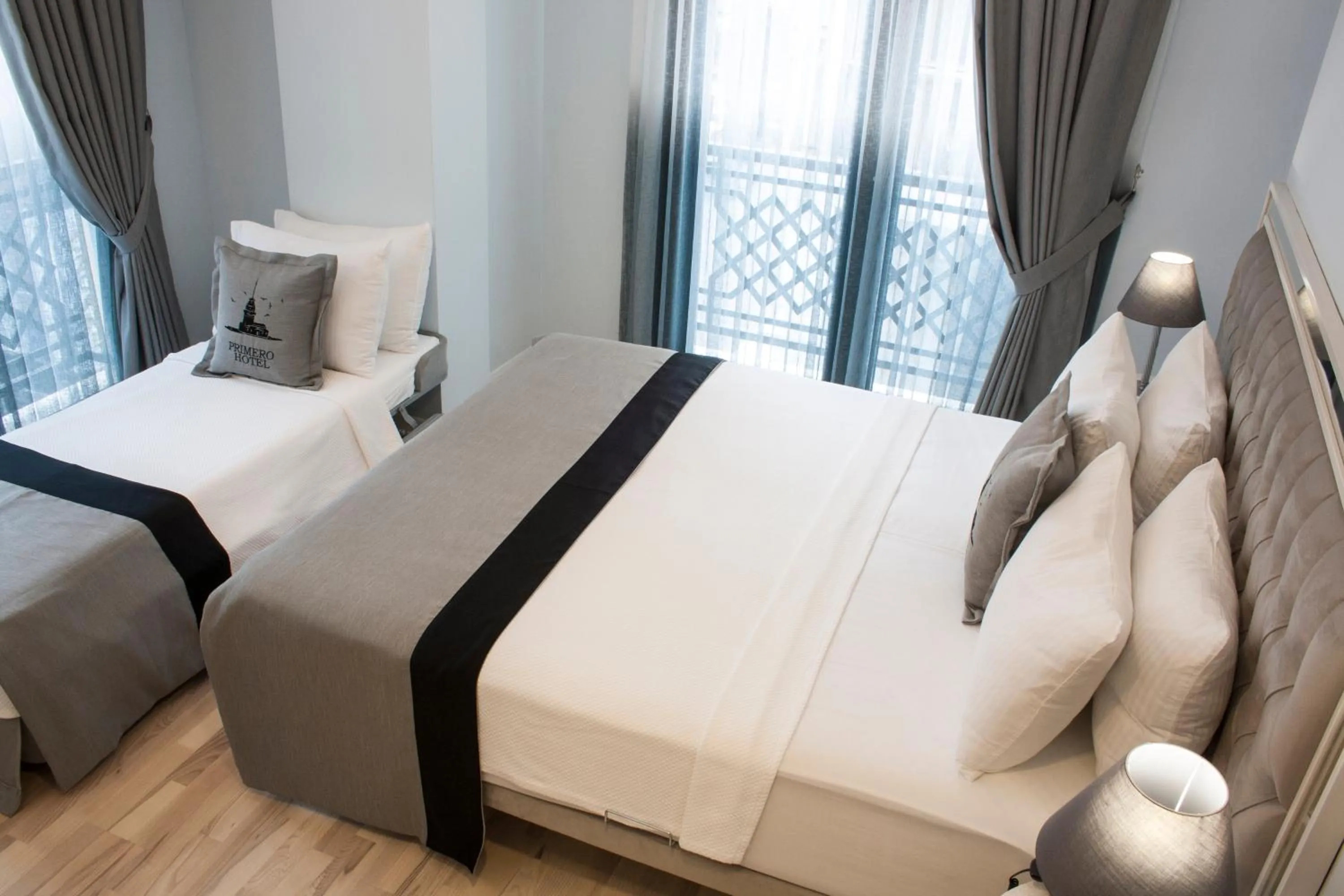 Photo of the whole room, Bed in Primero Hotel