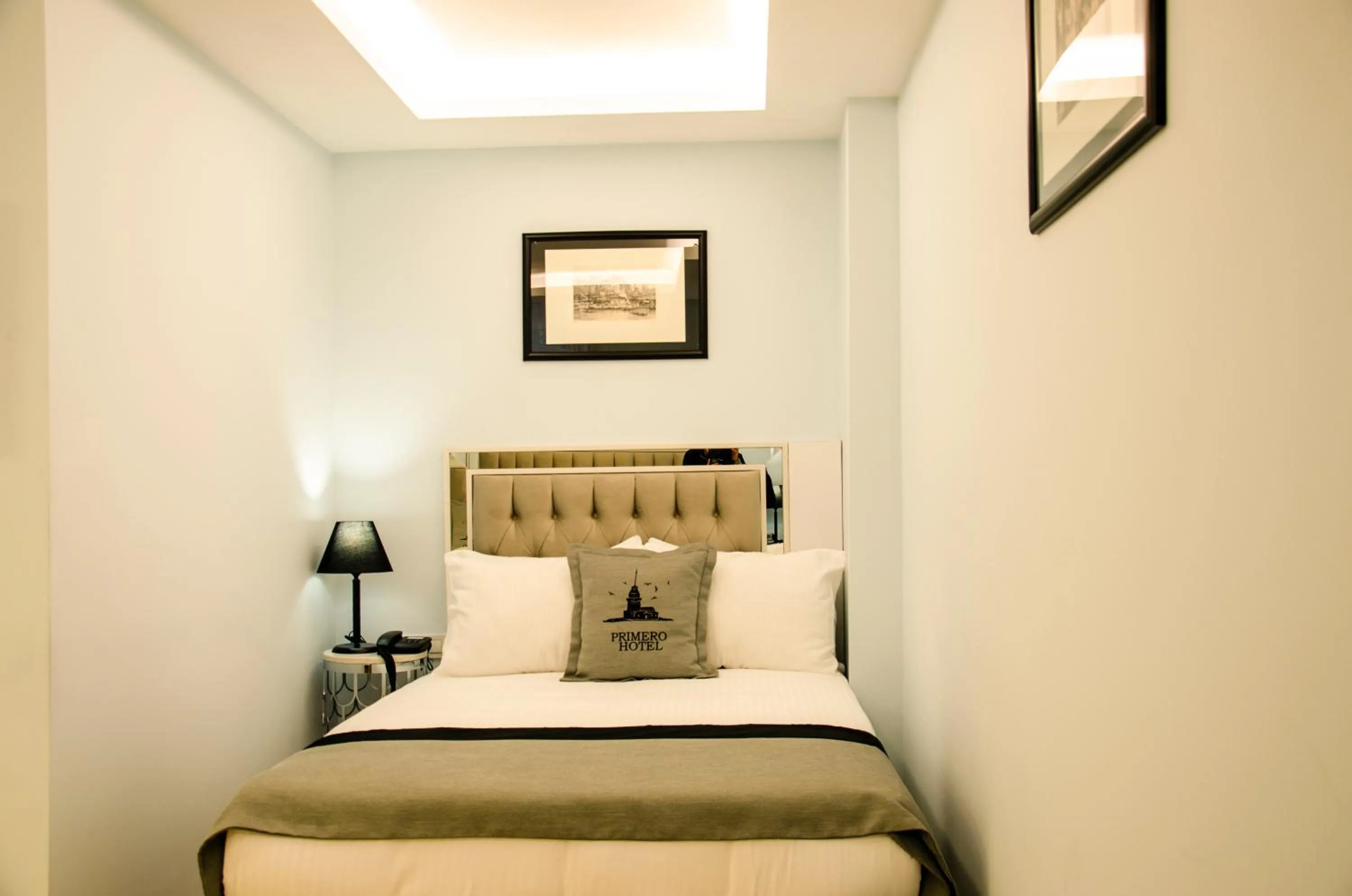 Bed in Primero Hotel