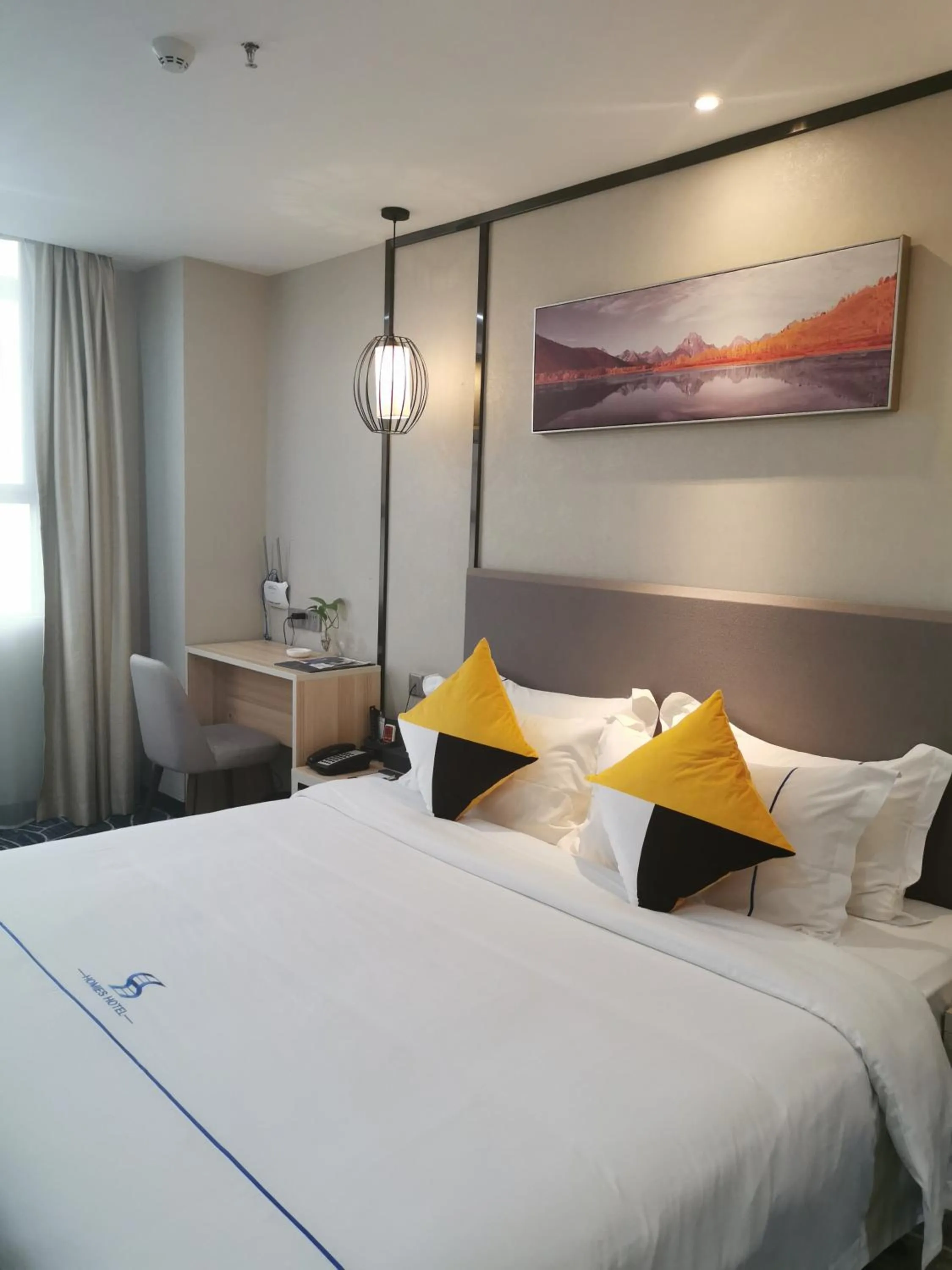 Bed in Guangzhou Homies Hotel