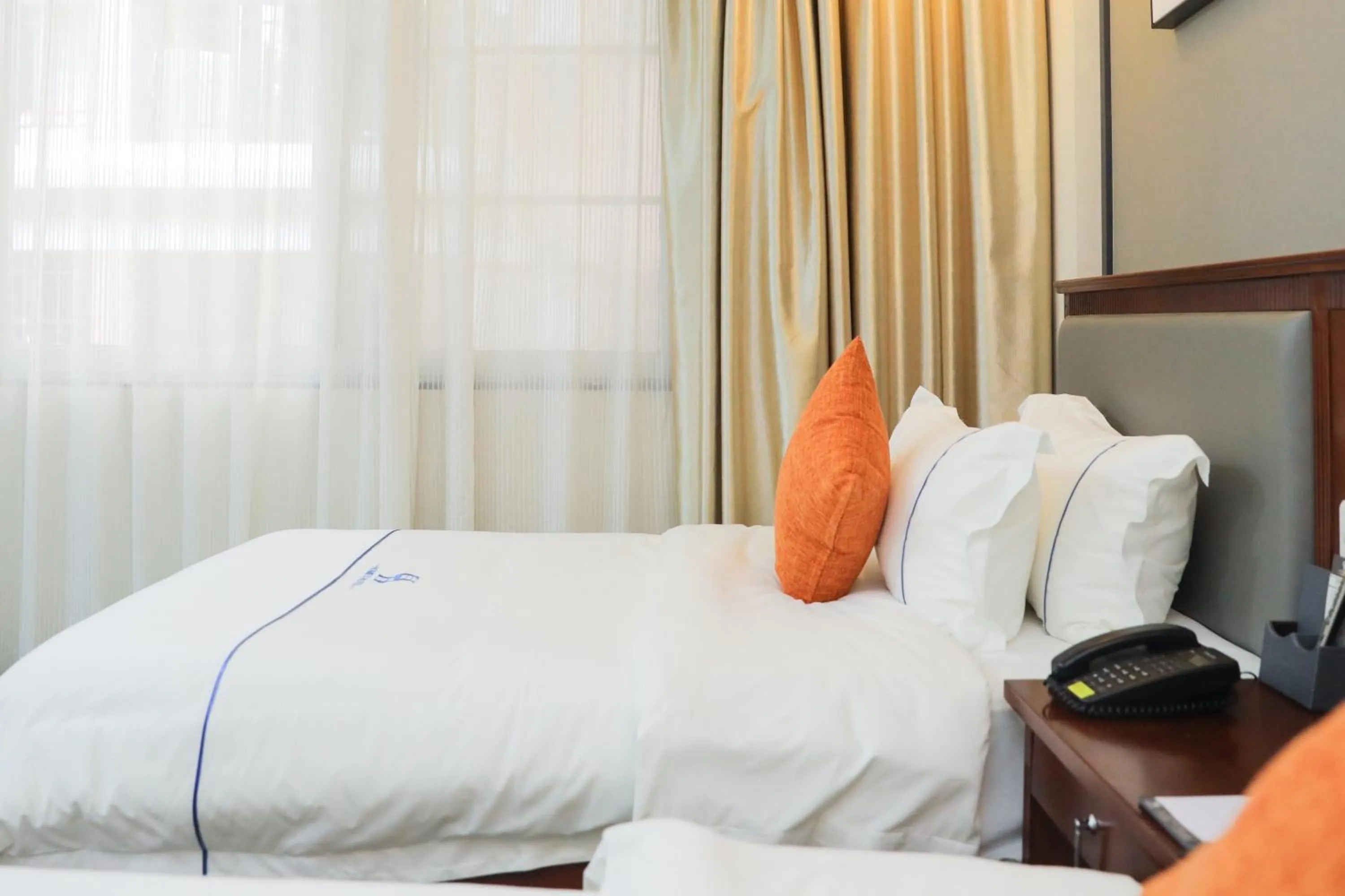 Bed in Guangzhou Homies Hotel