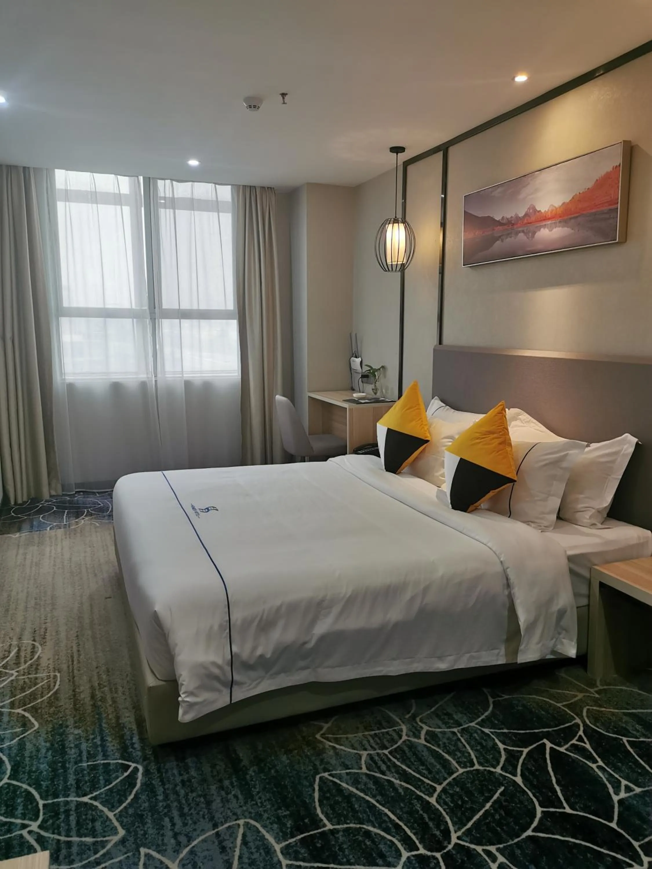 Bed in Guangzhou Homies Hotel