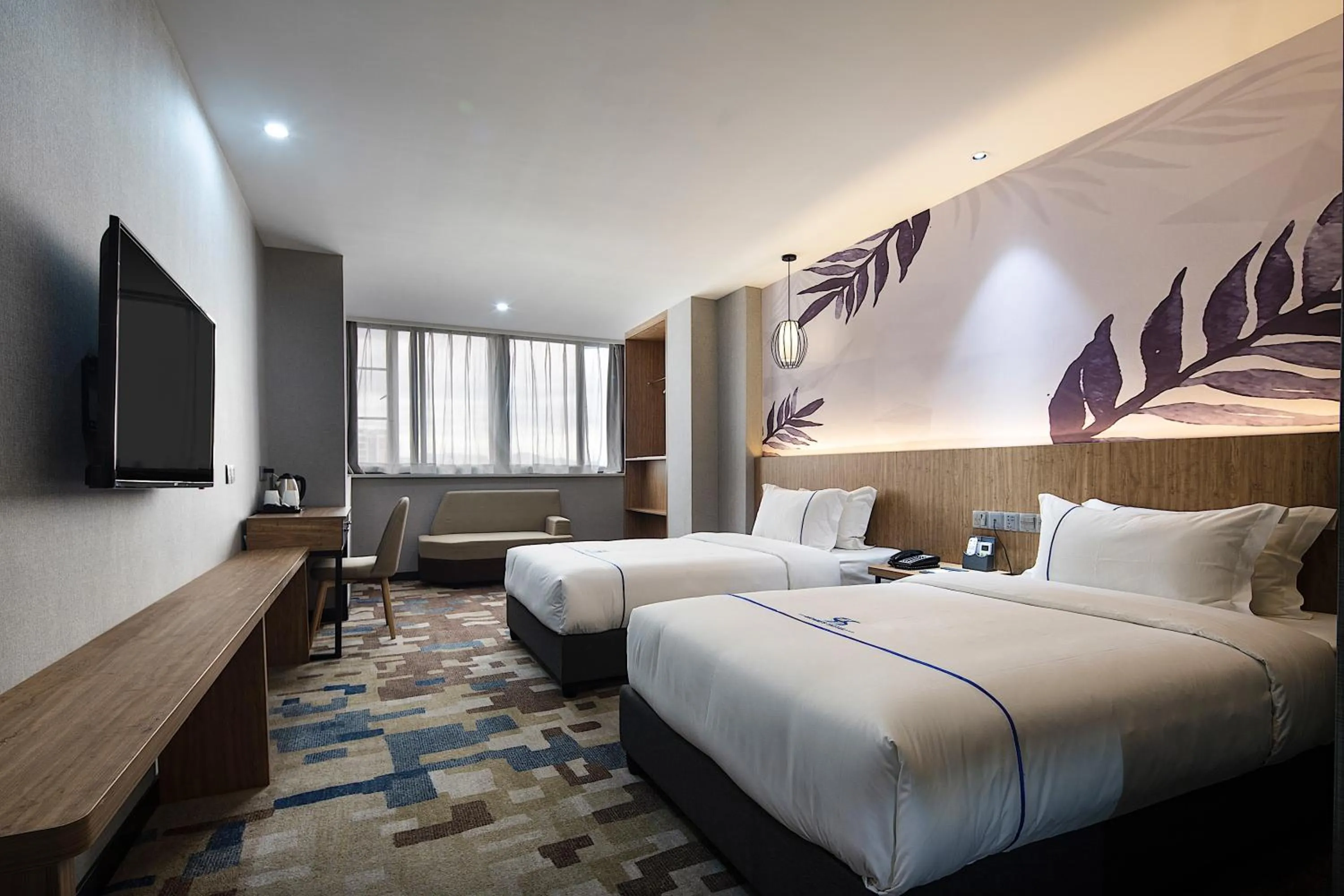 Bed in Guangzhou Homies Hotel