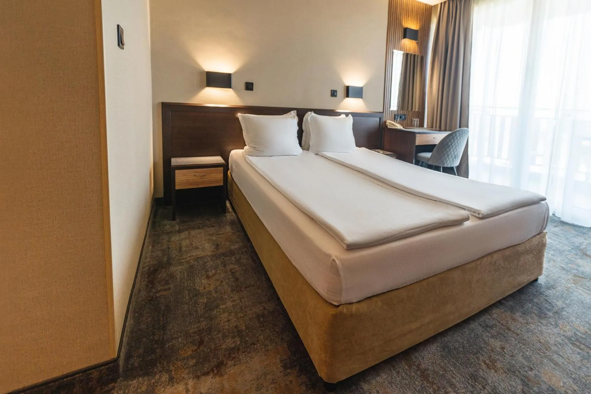 Bed in Kalithea Family Hotel