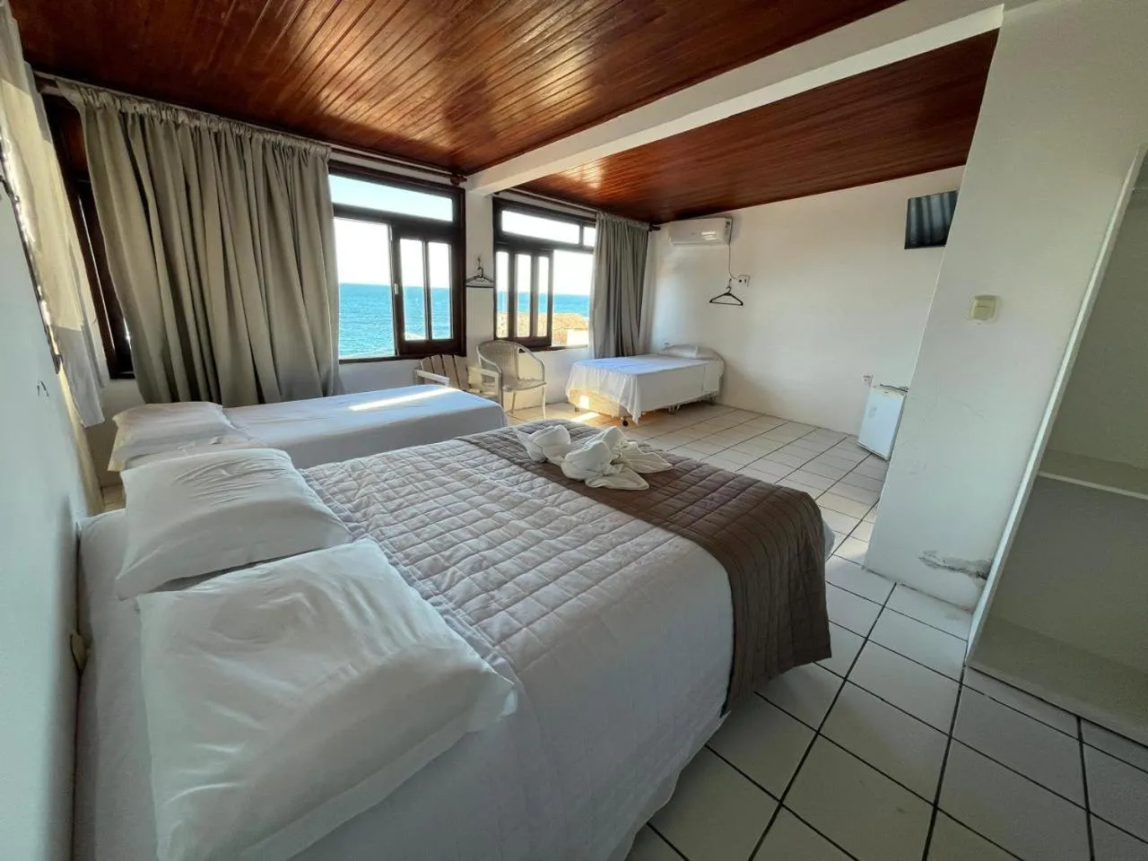 Bed in Pousada Farol do Morro