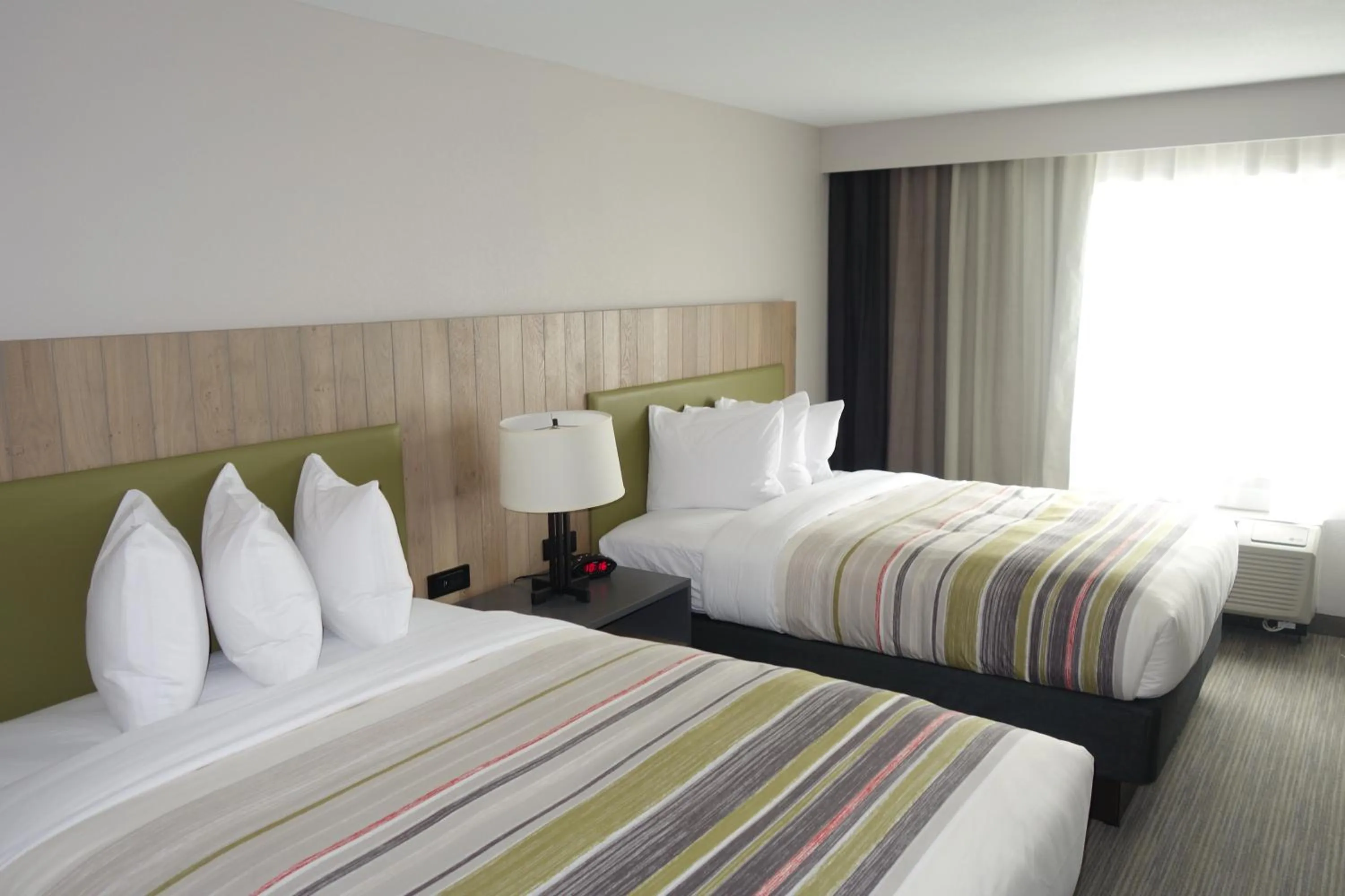 Bed in Country Inn & Suites by Radisson, Lawrence, KS