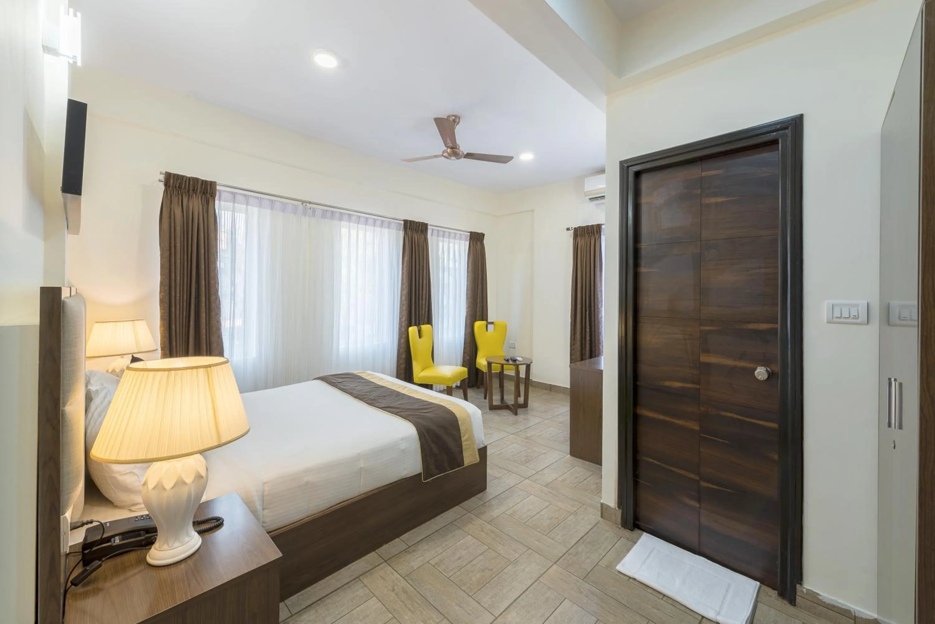 Photo of the whole room, Bed in Daffodil Delight - Manyata Tech Park