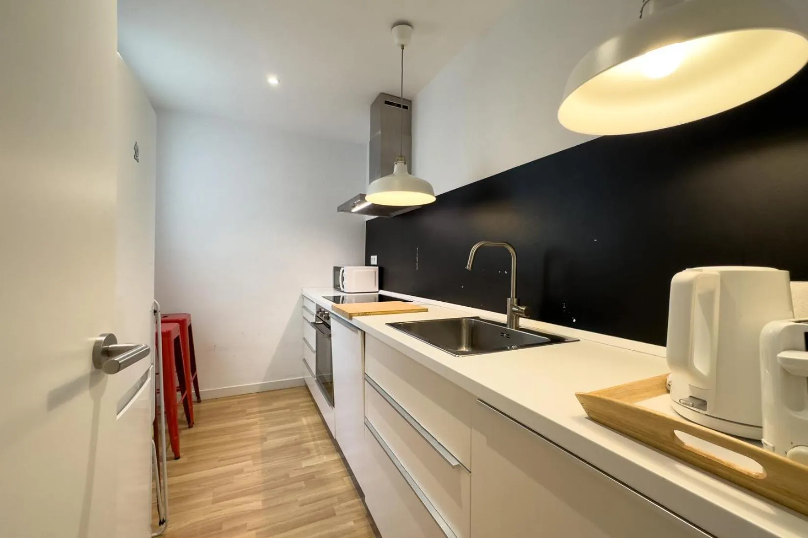 Kitchen or kitchenette in AinB Barcelona Sants Apartments