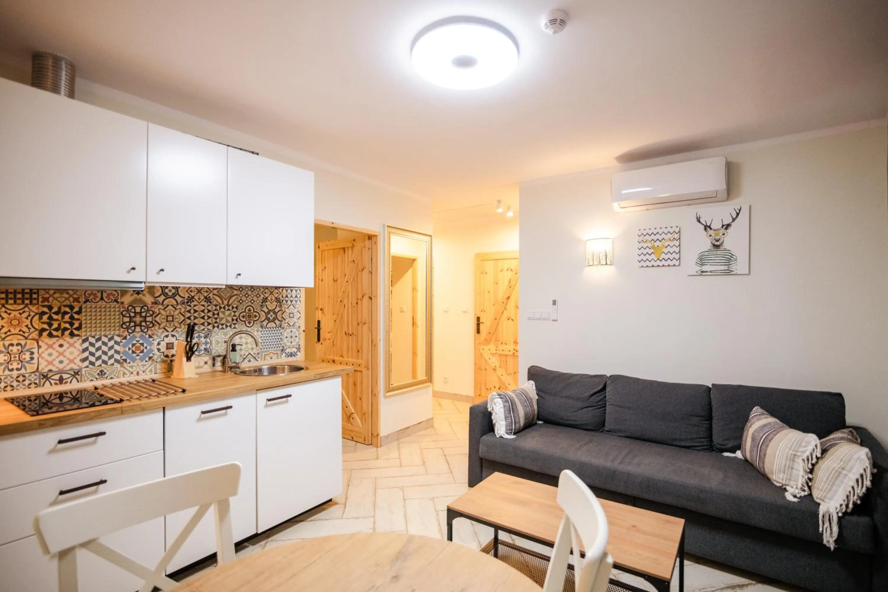 Kitchen or kitchenette in Zacisze,pl Domki Premium i Bungalowy Deluxe nad Jeziorem Łagowskim