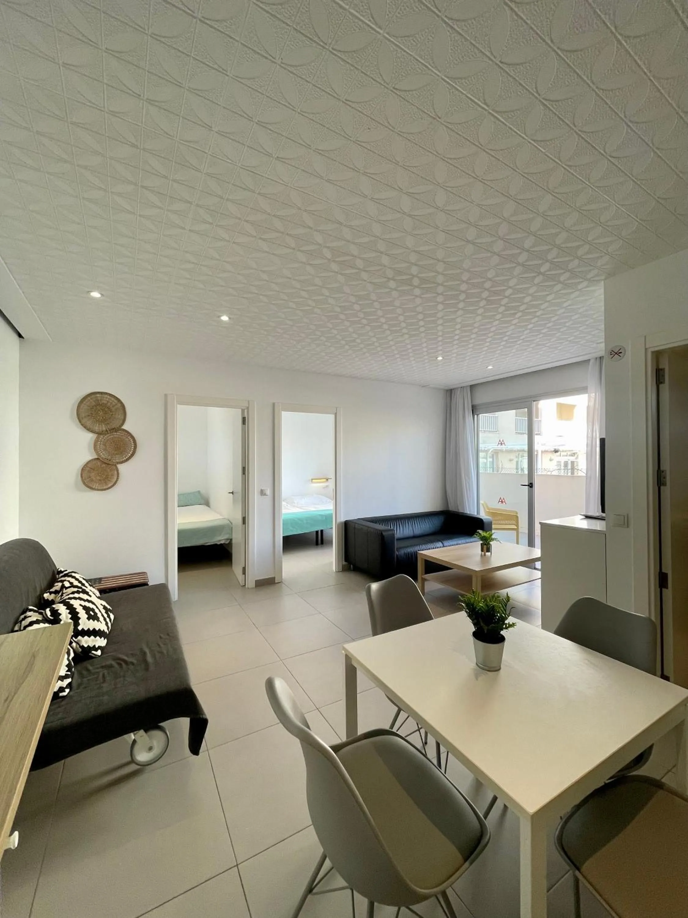 Bed in Apartaments La Perla Negra