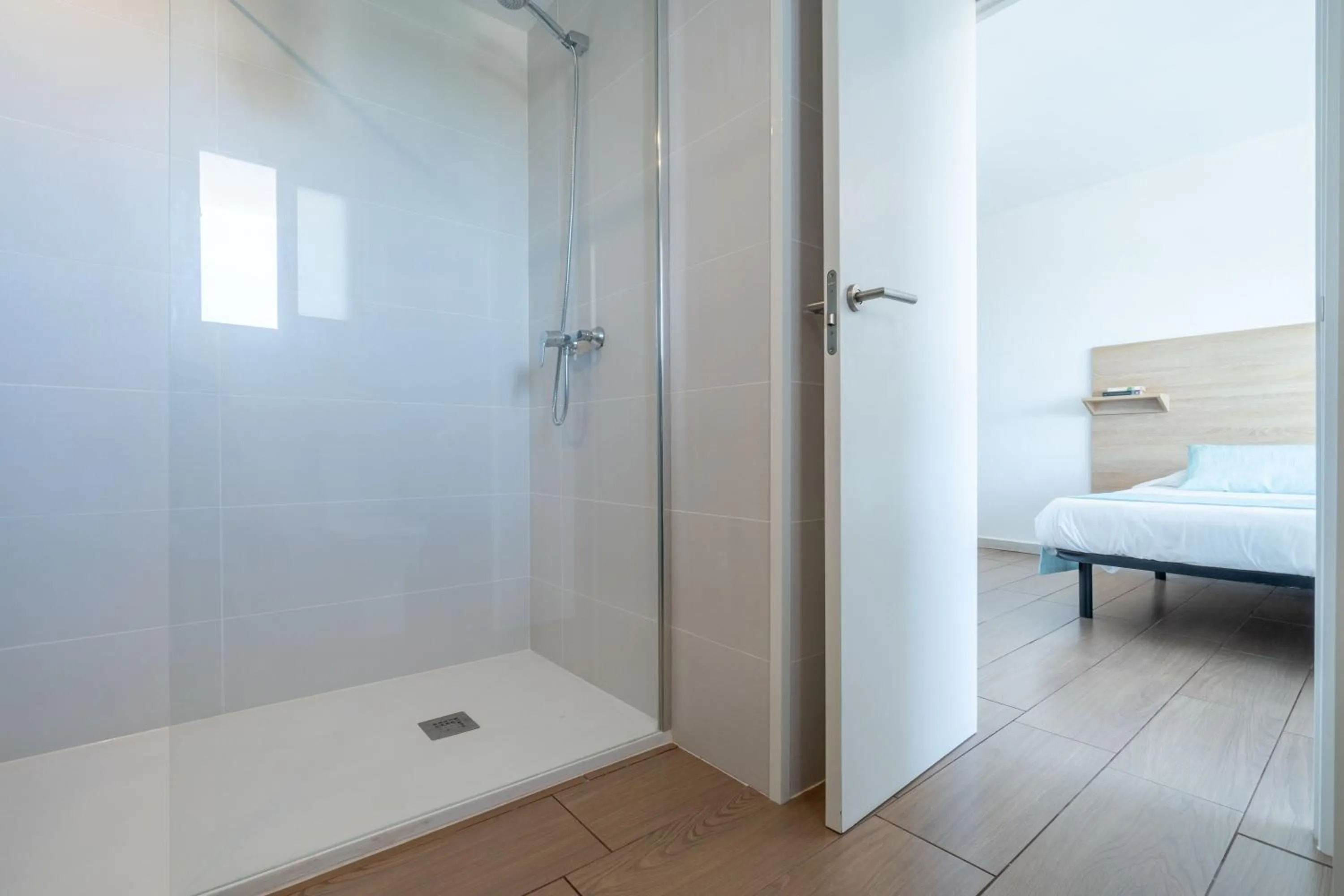 Bed in Apartaments La Perla Negra