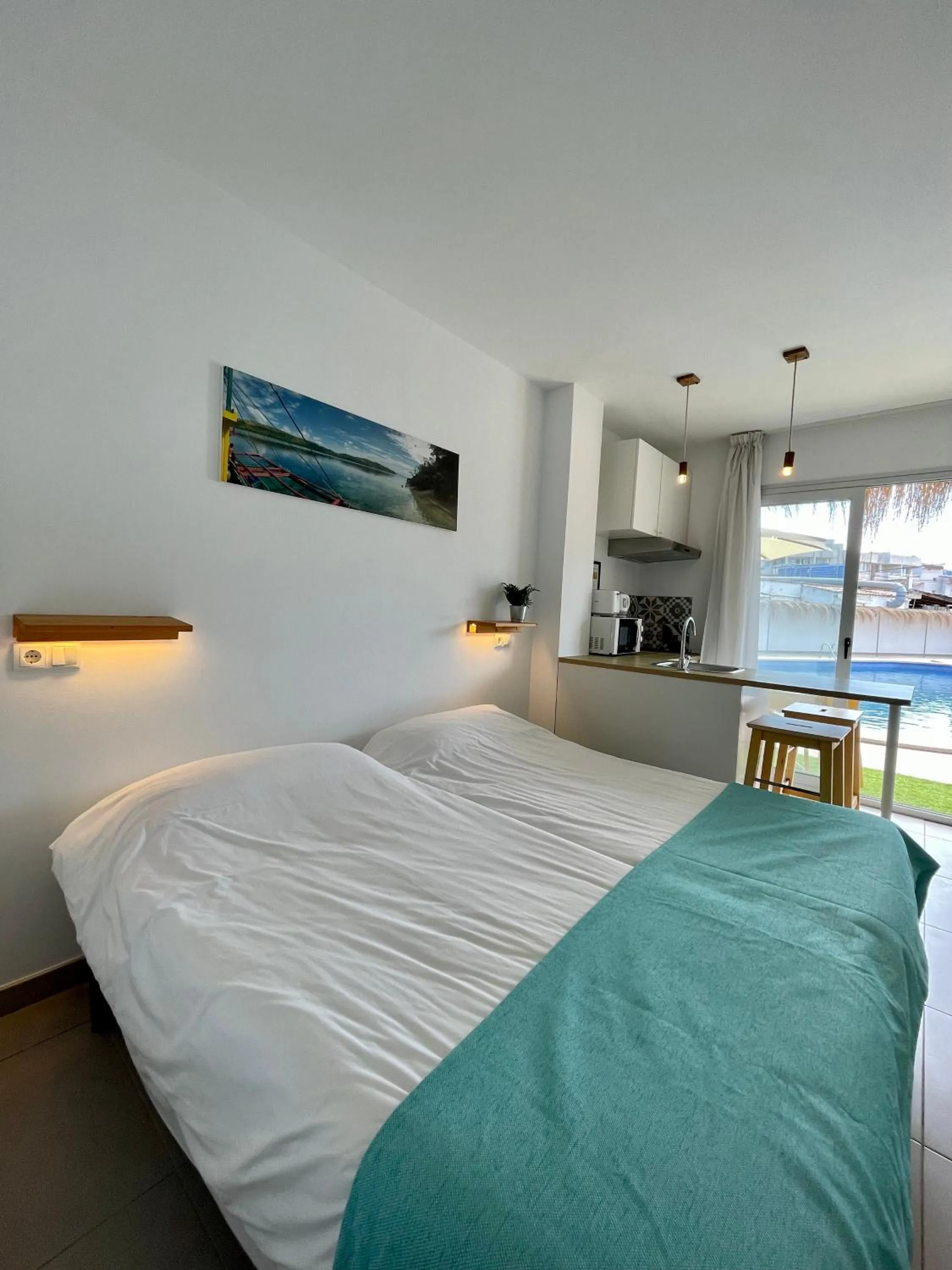 Bed in Apartaments La Perla Negra