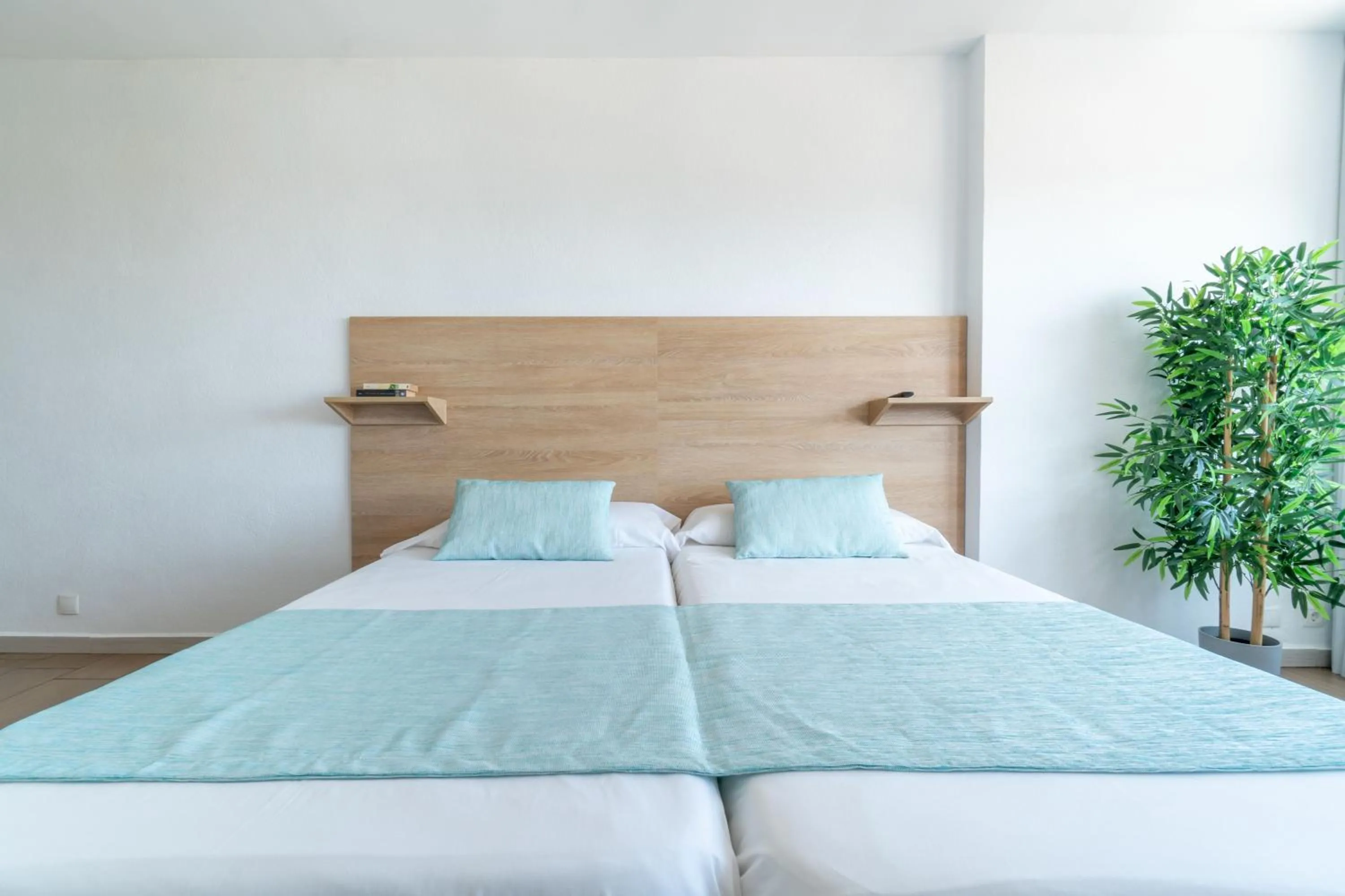 Bed in Apartaments La Perla Negra