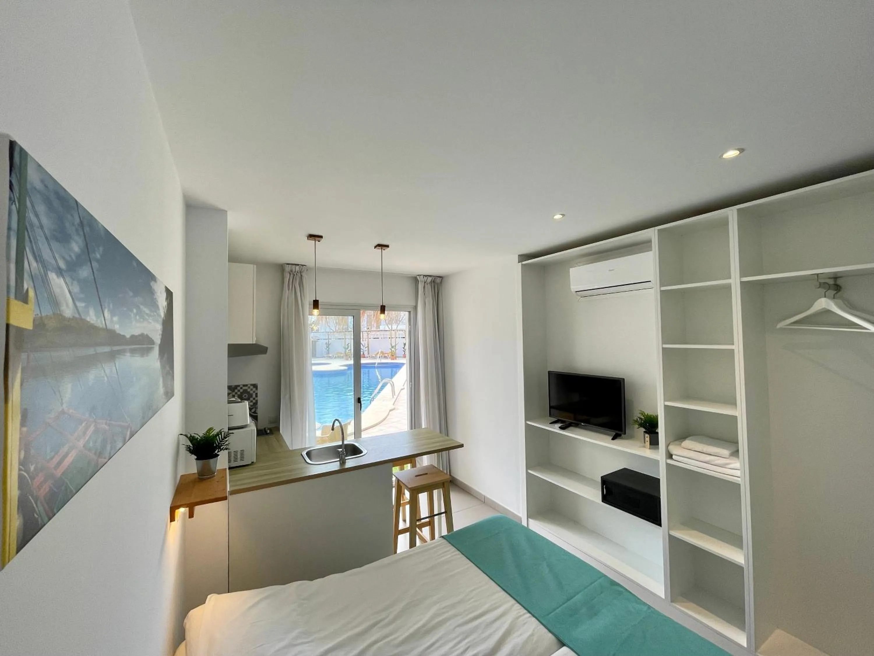 Bed in Apartaments La Perla Negra