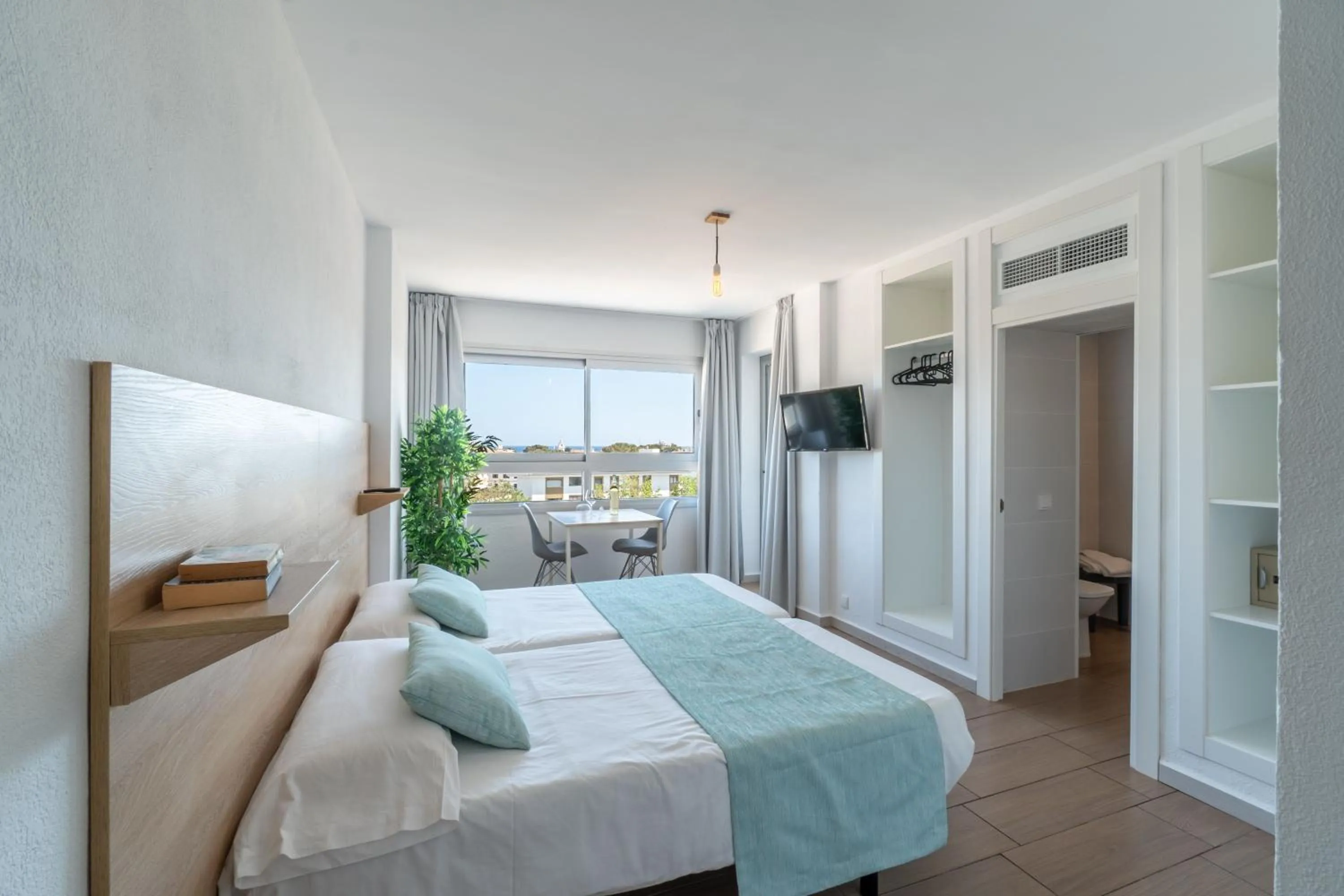 Bed in Apartaments La Perla Negra